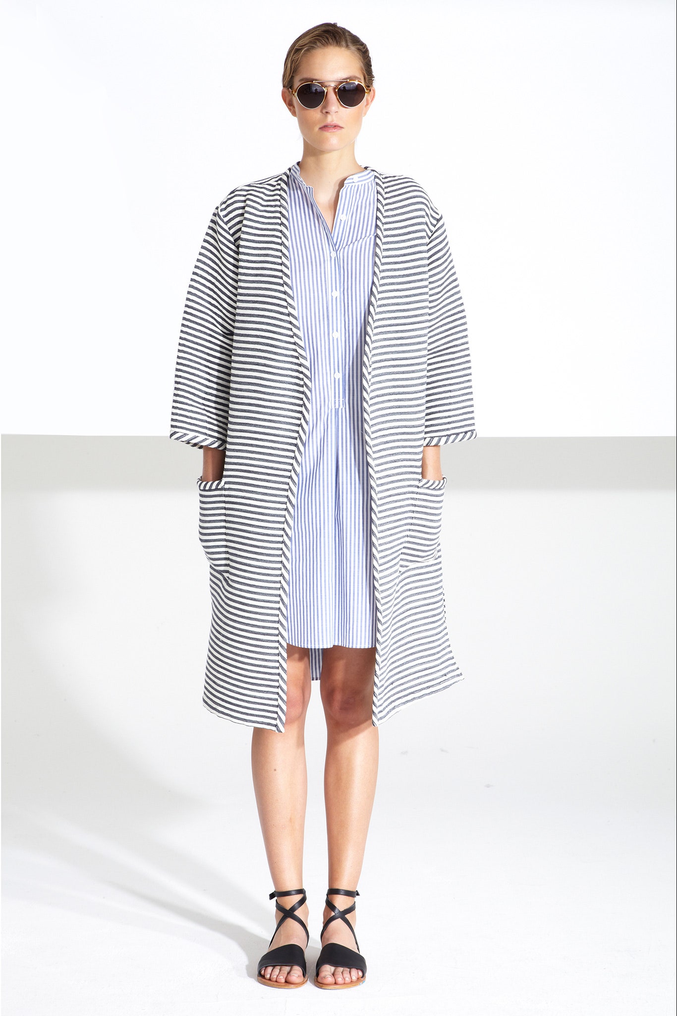 striped coat over mini dress
