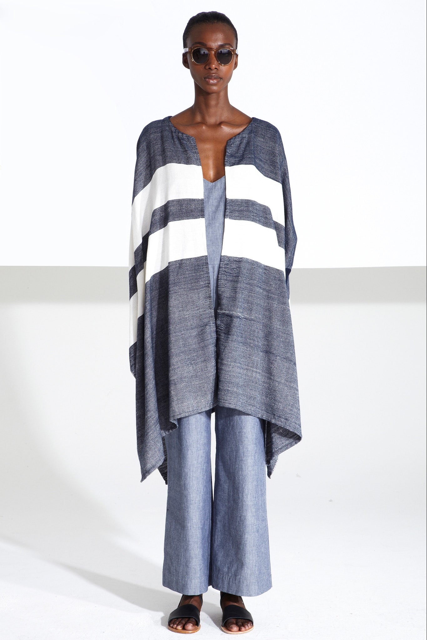 blue and white striped poncho