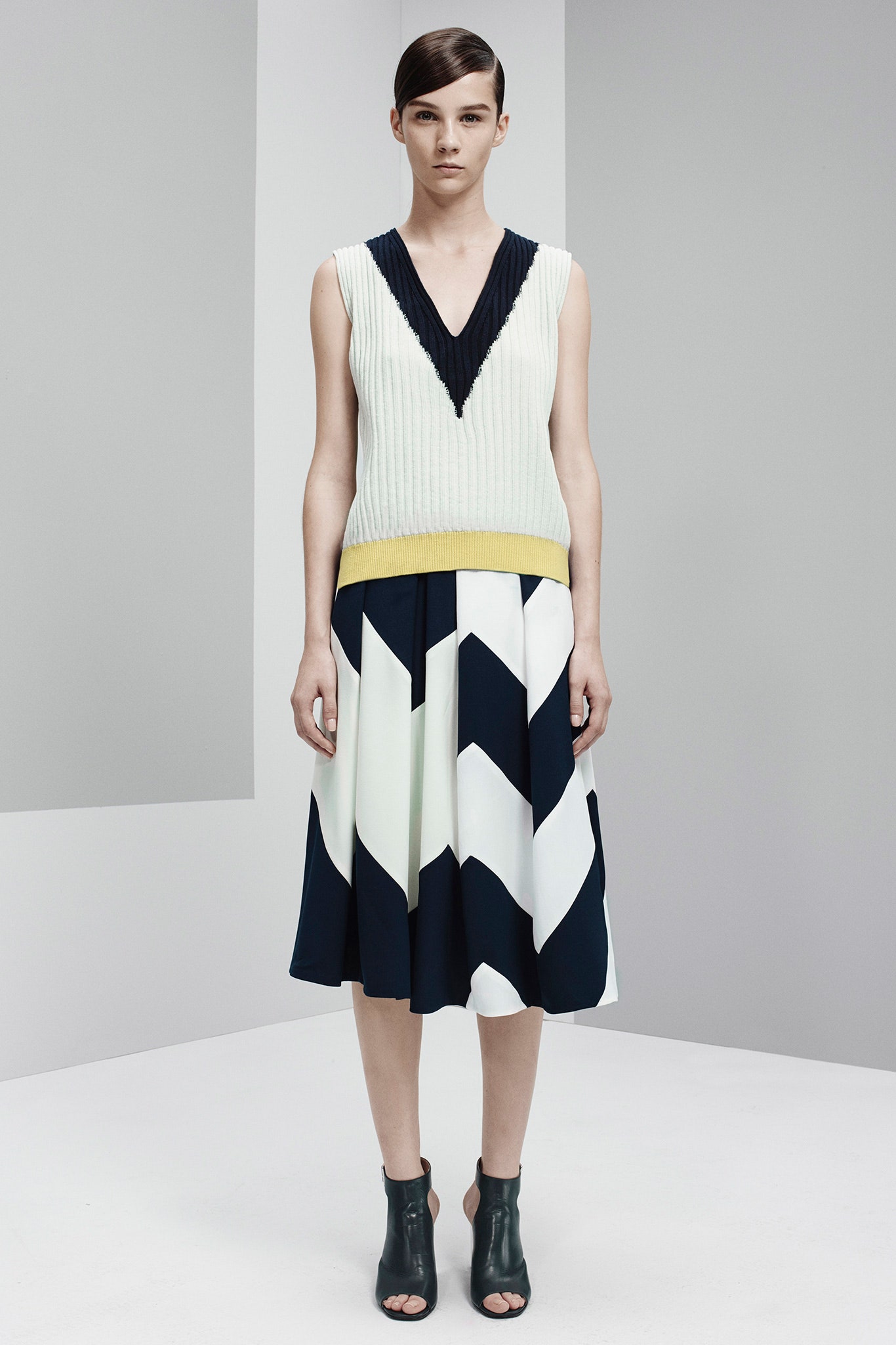 fitted sleeveless top and flared skirt