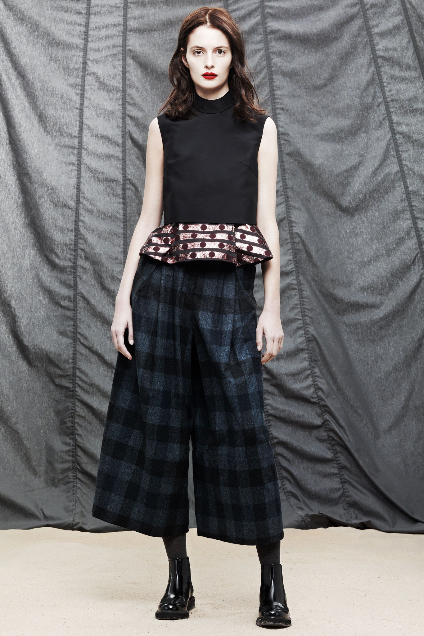 black fitted top with layered detail