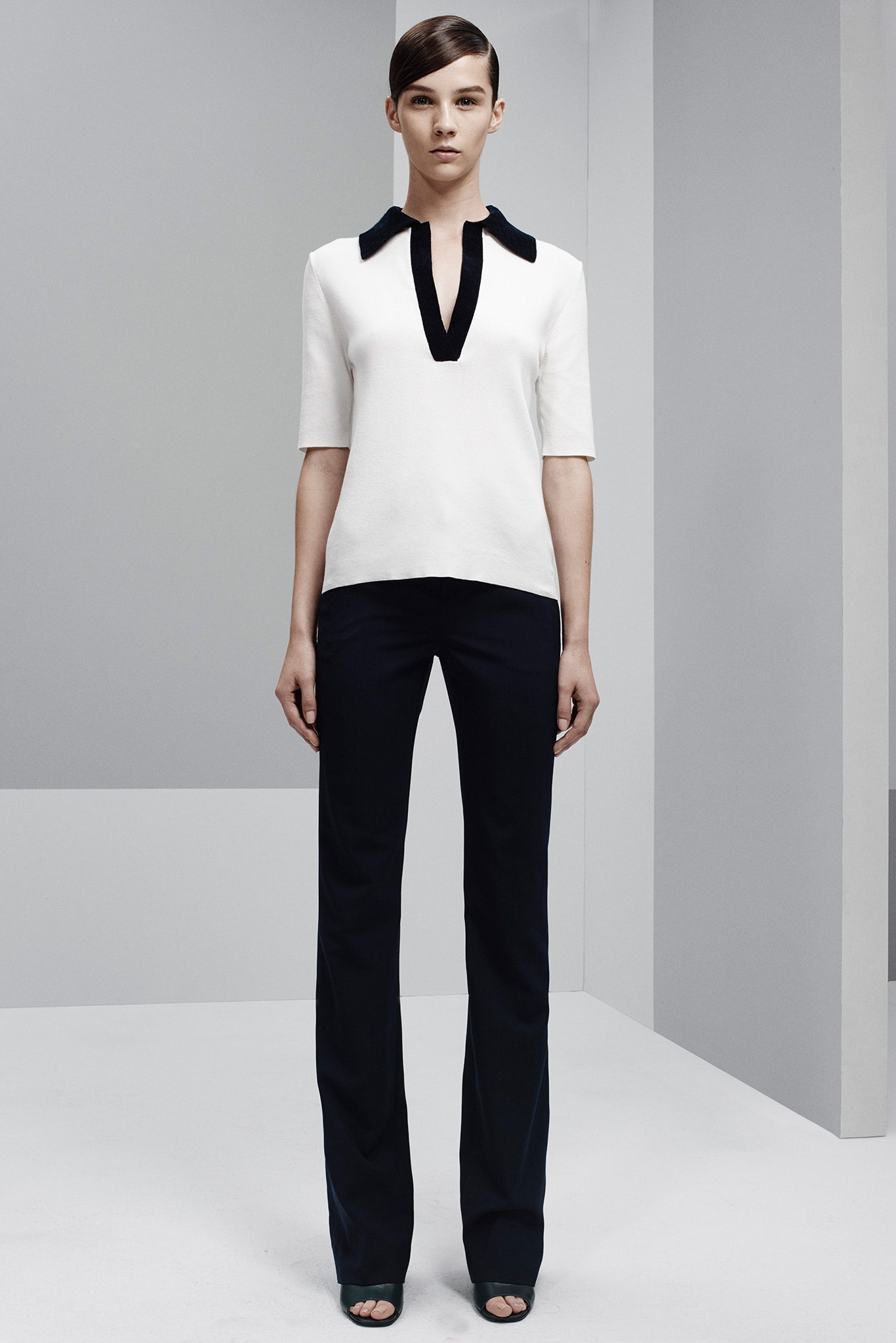 fitted white top and black pants