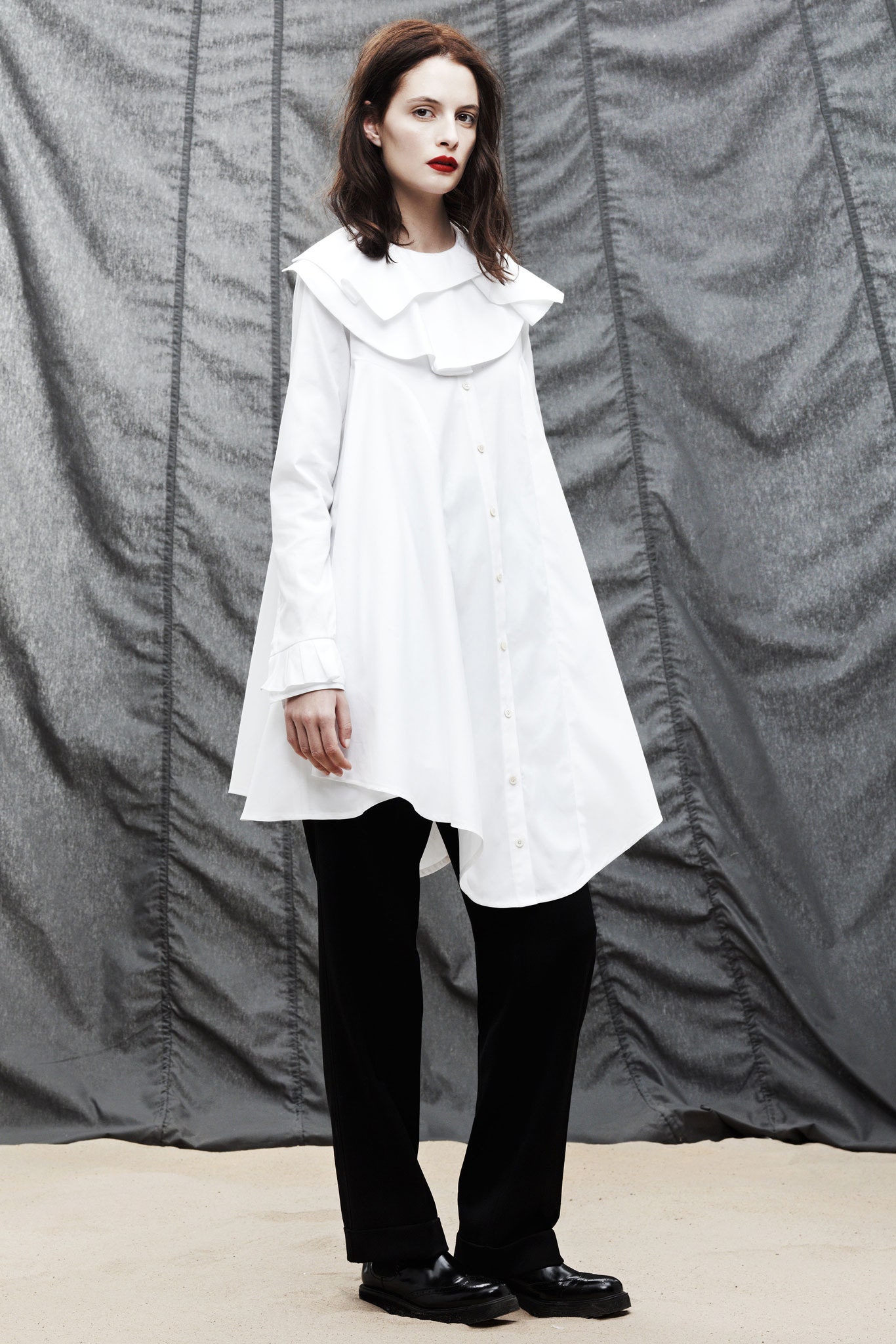 white shirt-dress with black pants