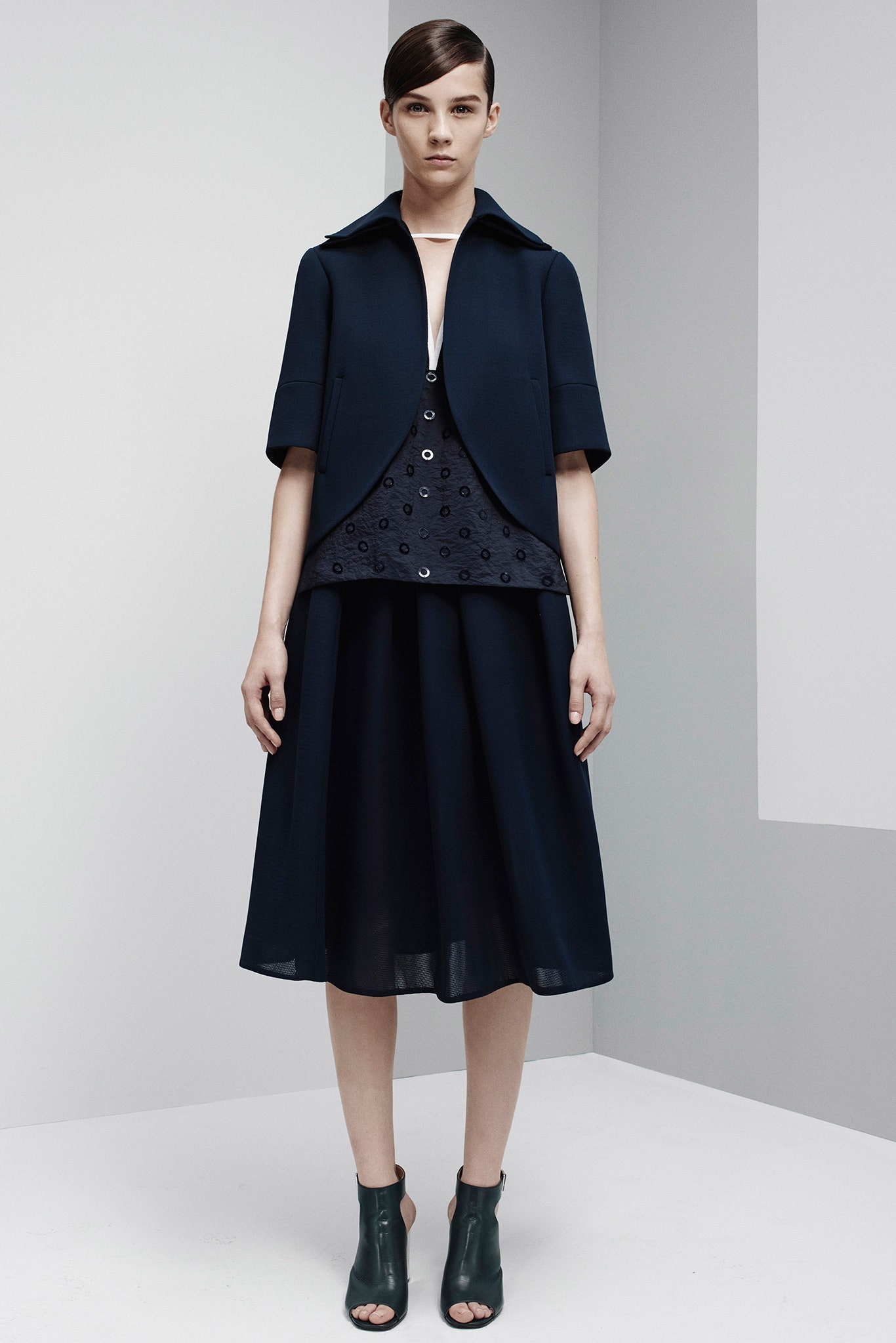 navy jacket and midi skirt