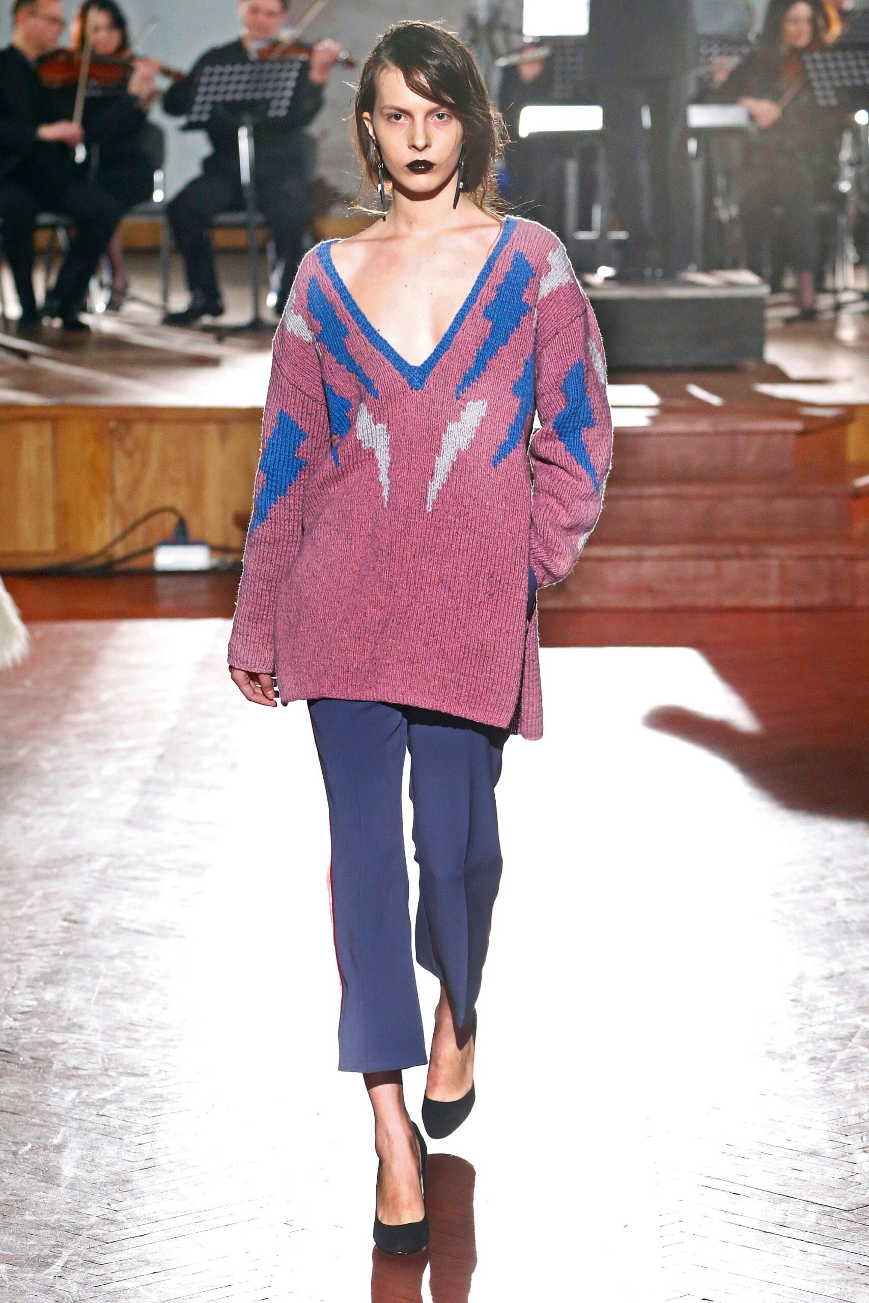 pink and blue relaxed sweater with tailored pants