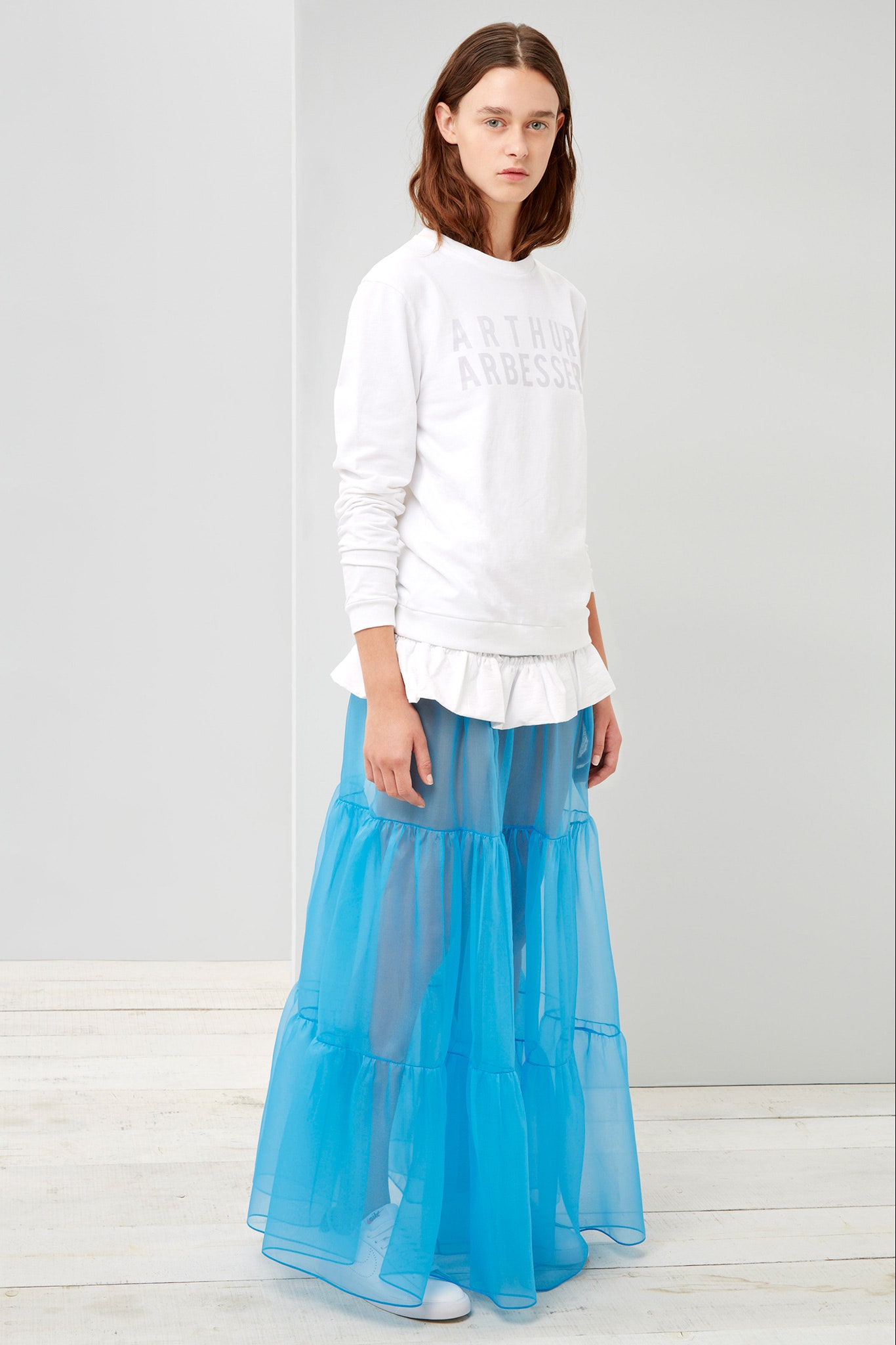 white relaxed top with blue maxi skirt