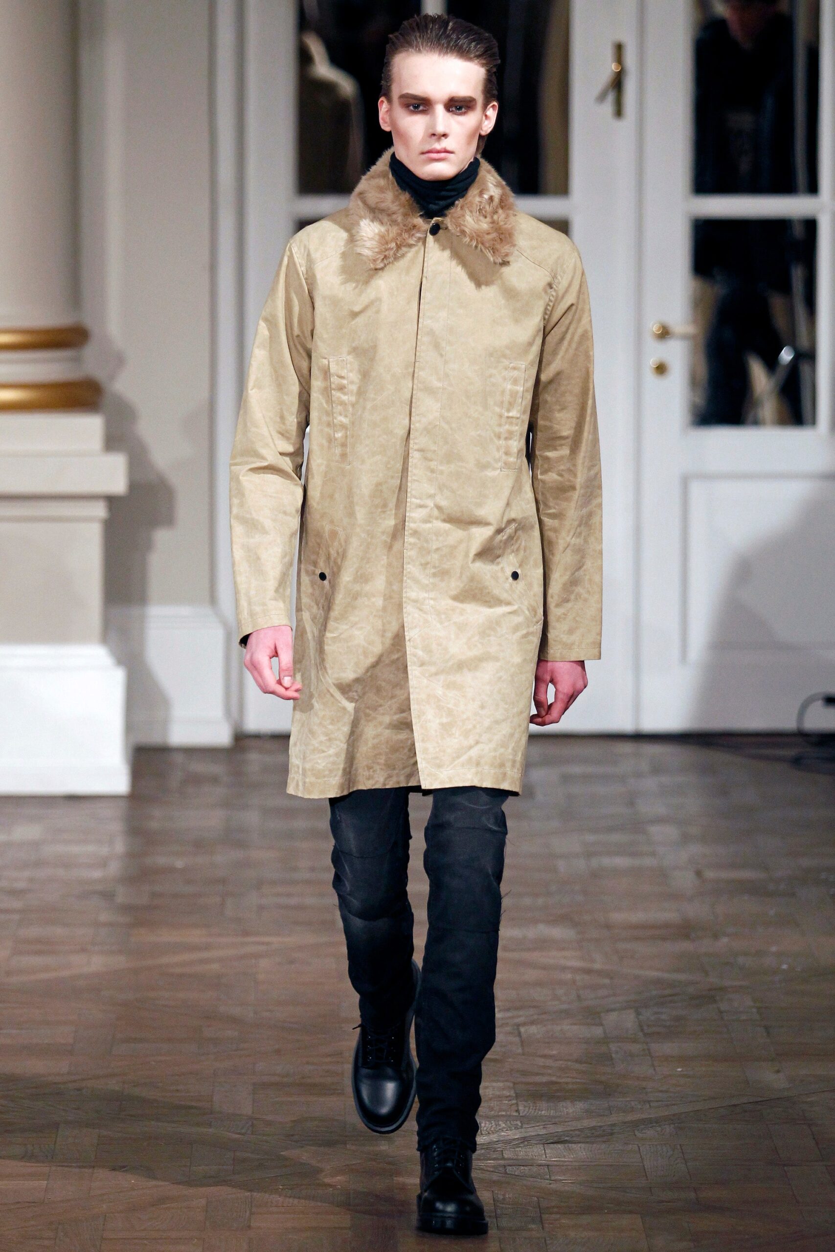 beige leather coat with black pants