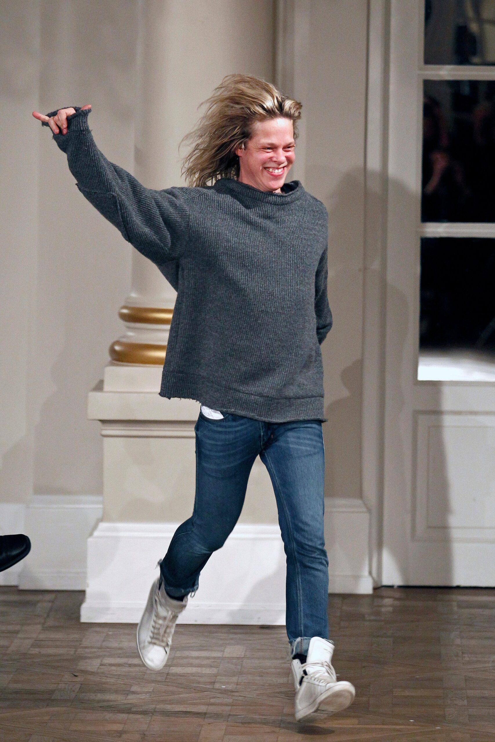gray relaxed sweater with blue jeans