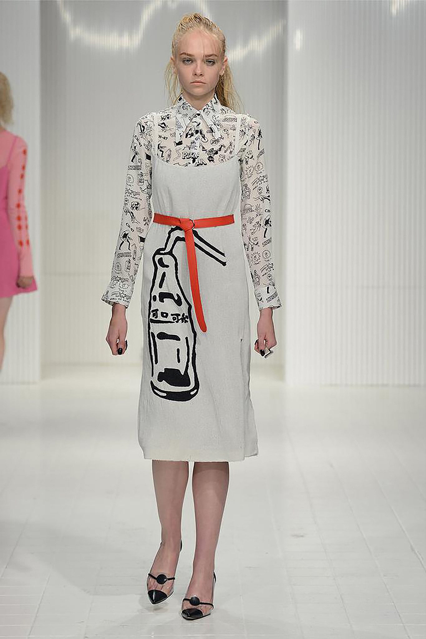 white printed midi dress with orange belt