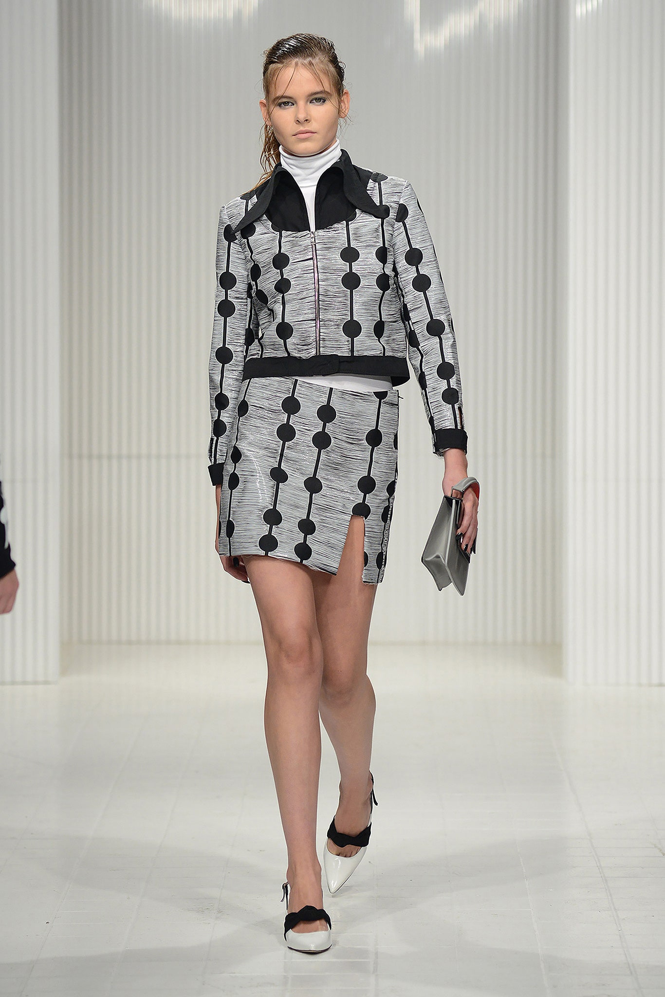 fitted black and white jacket and skirt