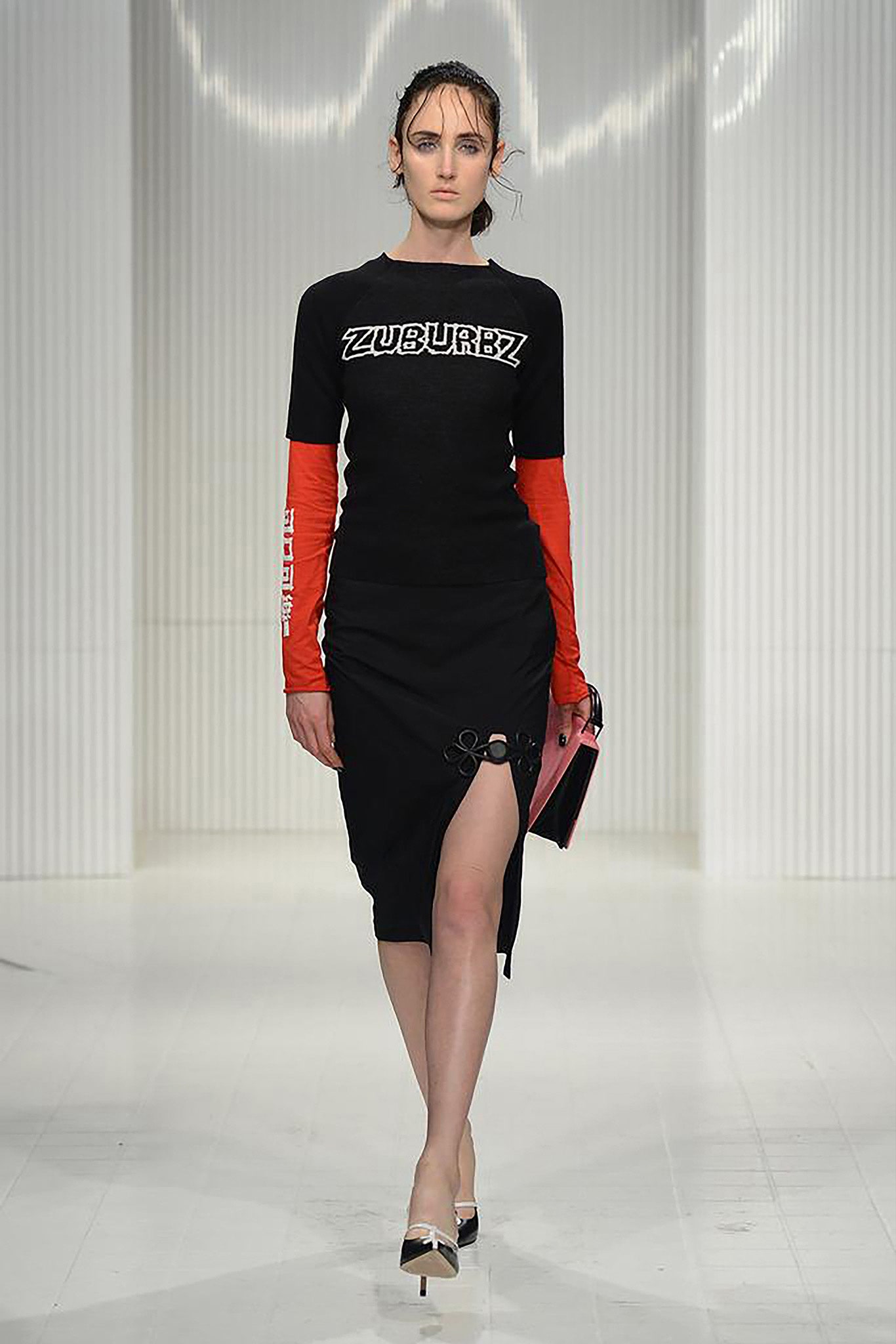black and red fitted top with asymmetric skirt