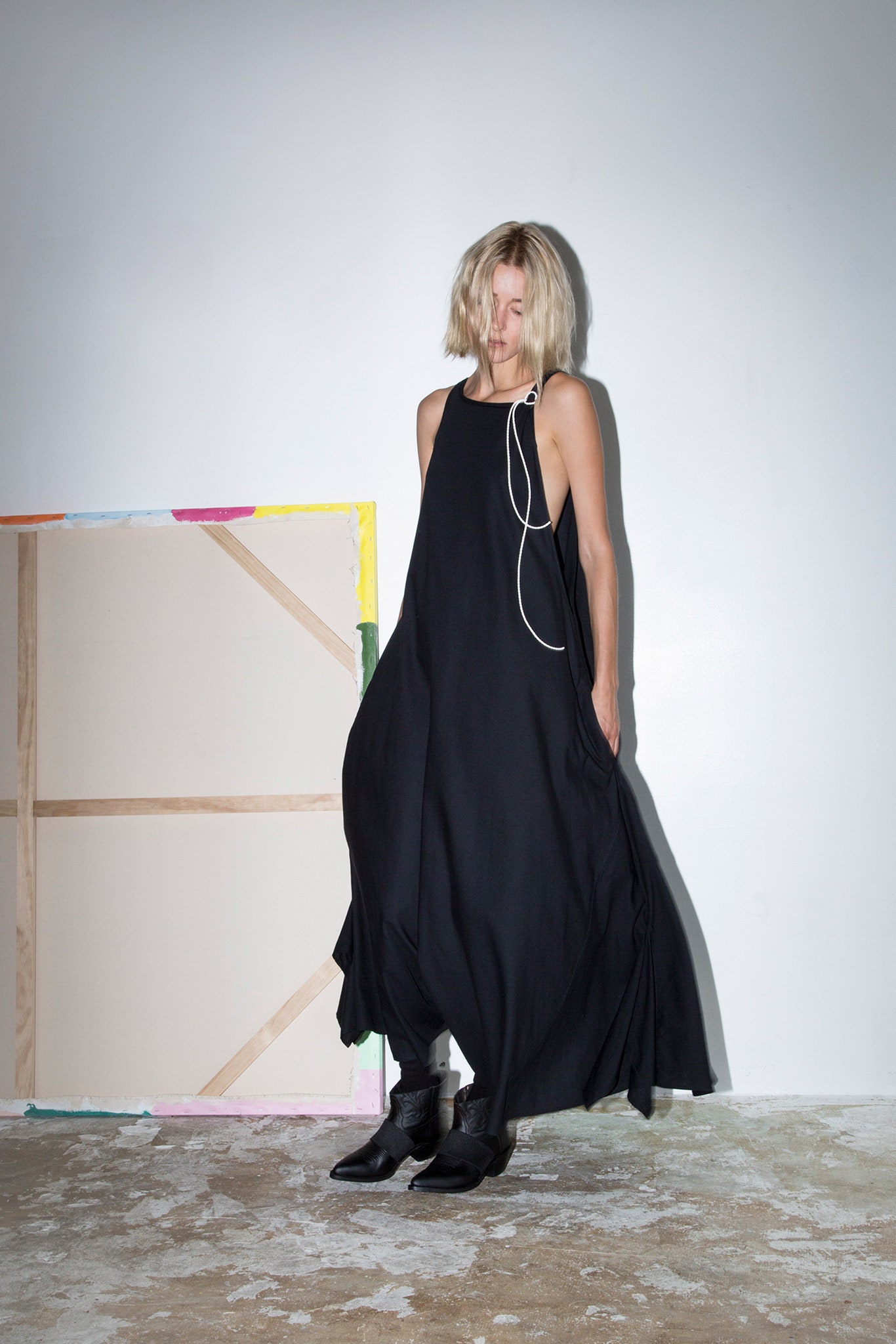 black silk sleeveless high-neck relaxed tiered flowing dress