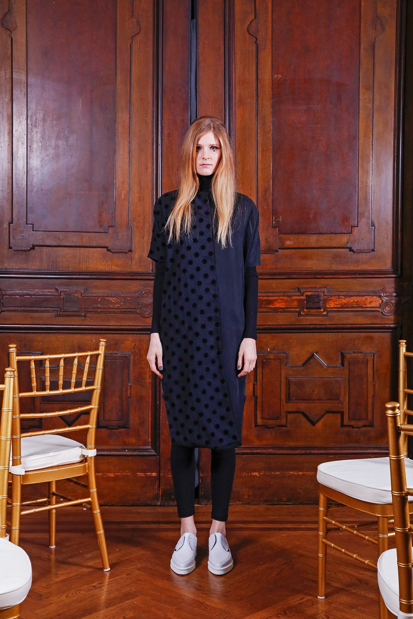 black polka-dot midi dress with fitted pants