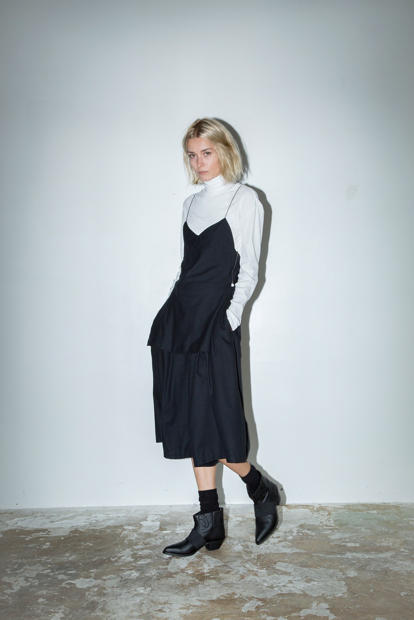 black leather fitted zippered boots