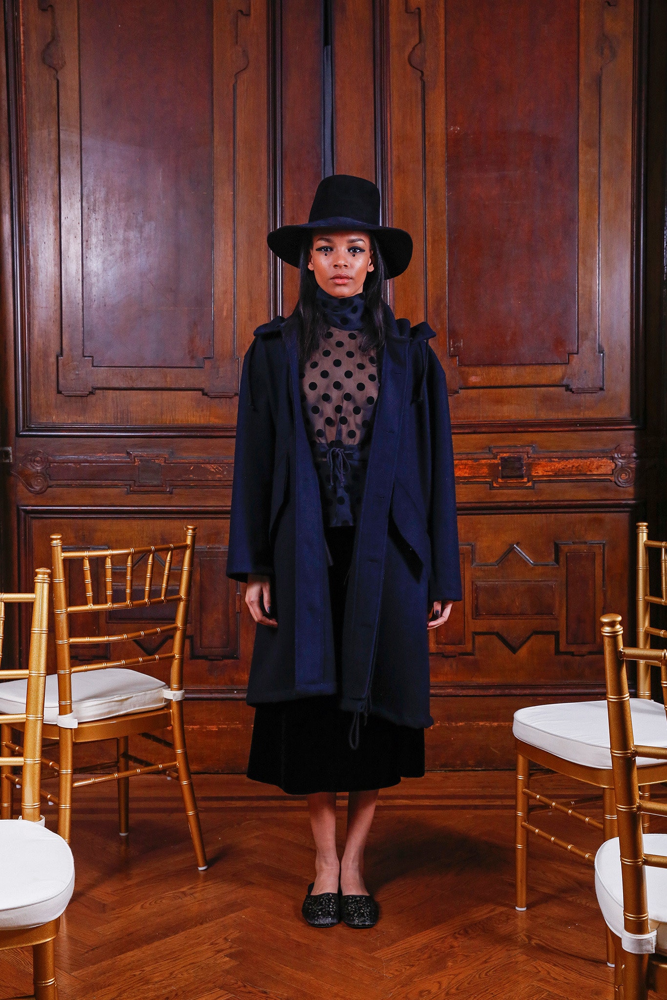 blue wool coat with black top