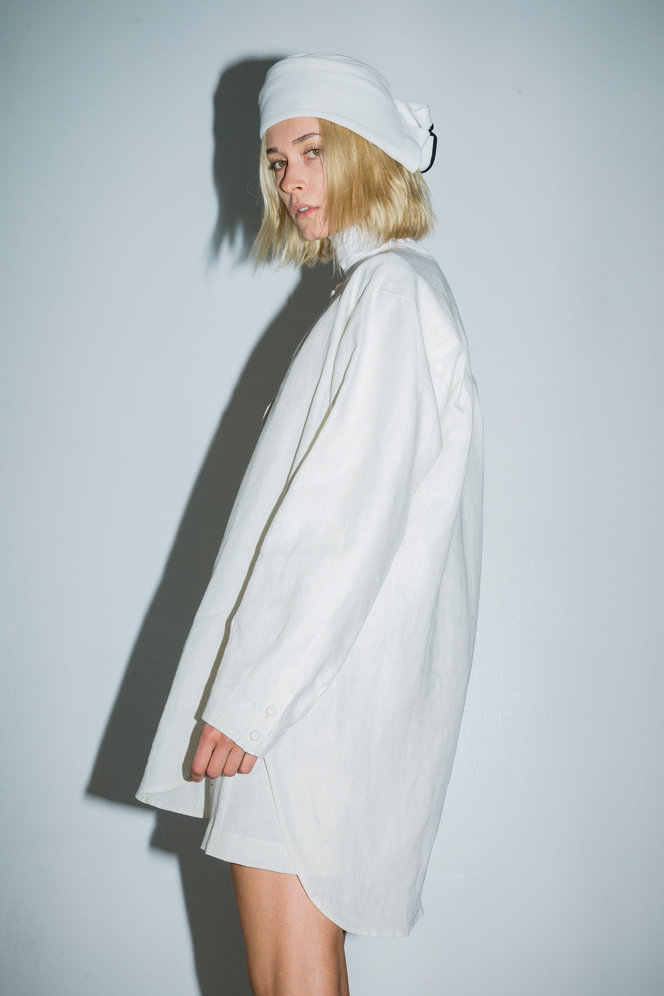 white cotton long-sleeve collared relaxed buttoned short shirt