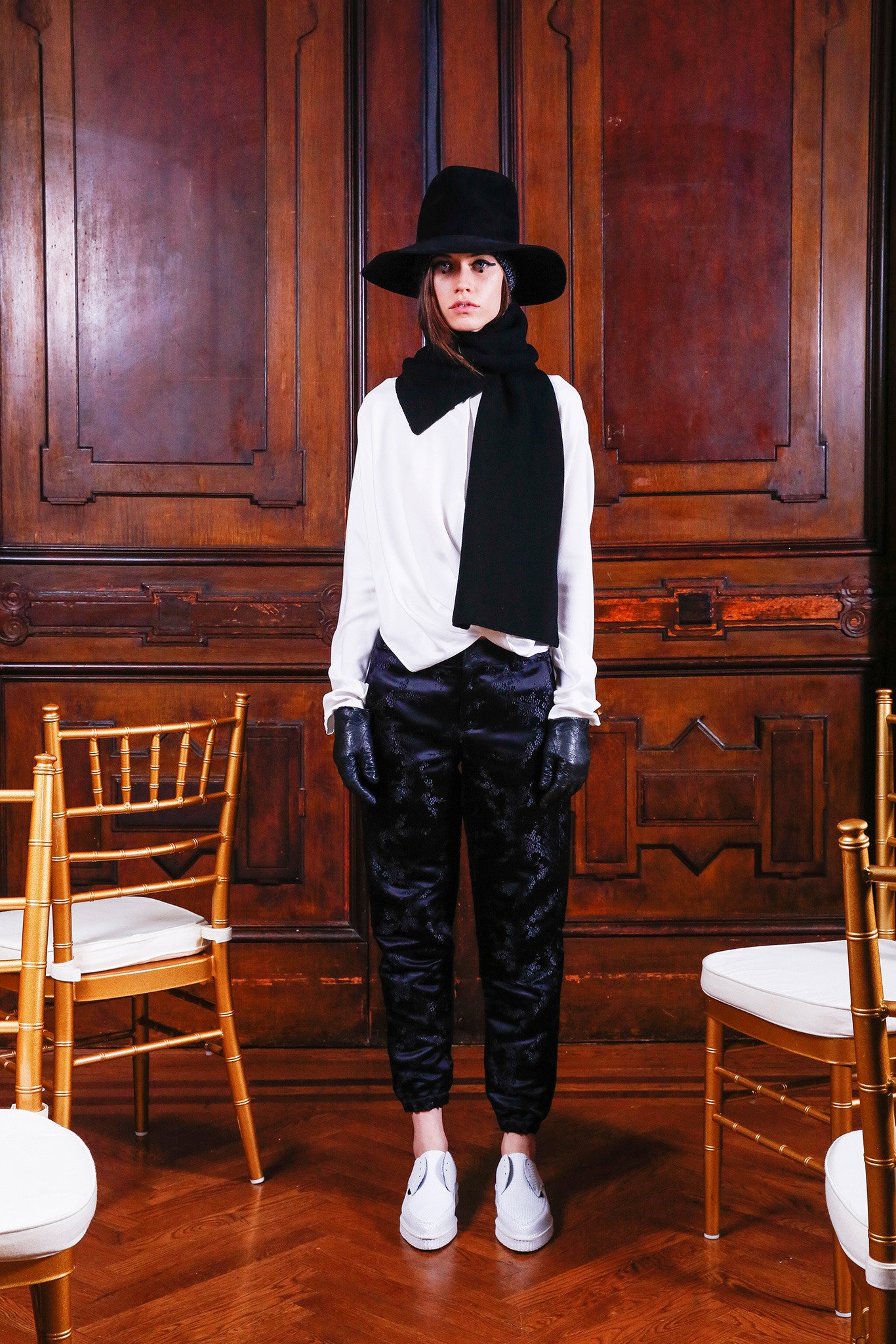white silk fitted top with black velvet pants