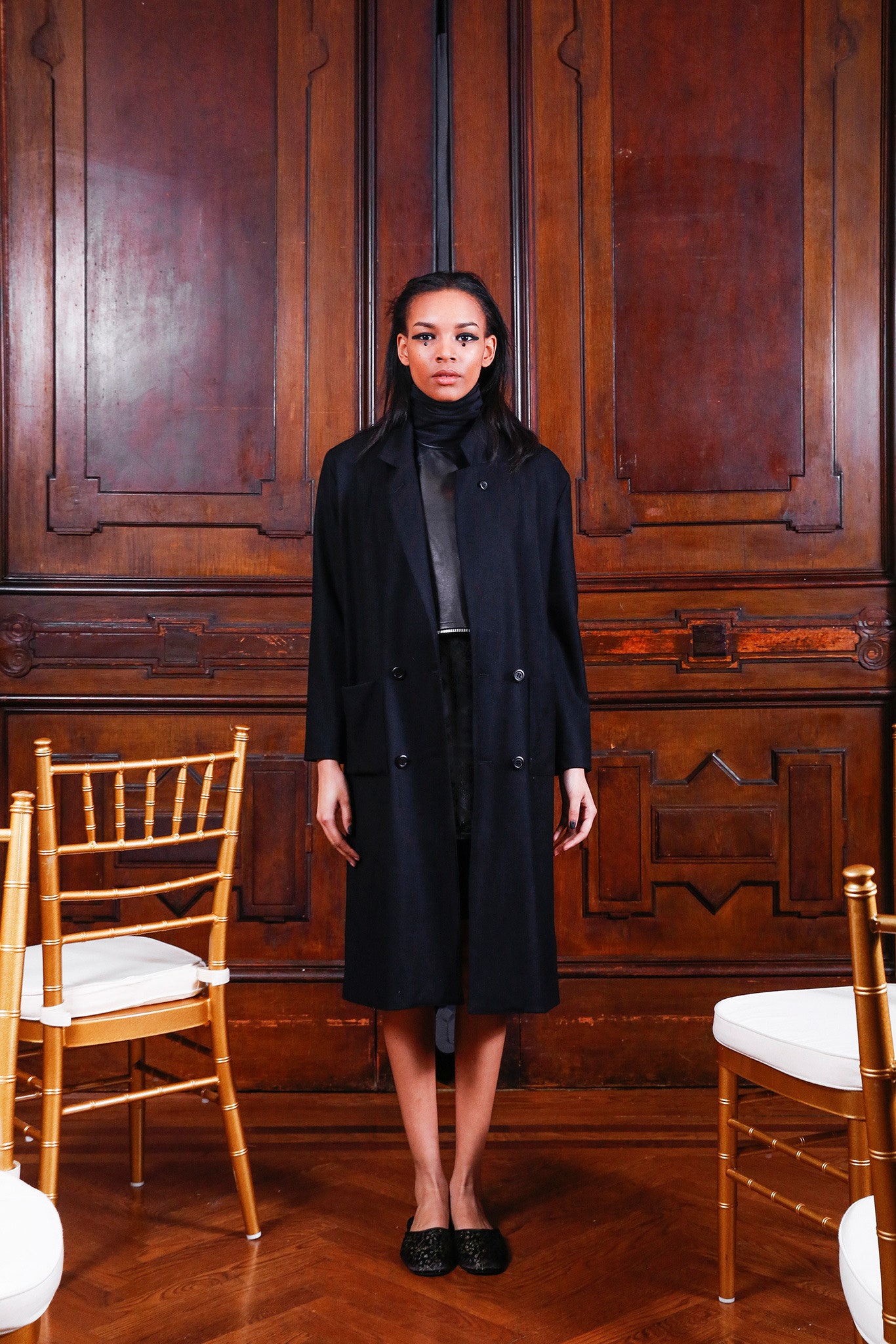 black fitted coat and top