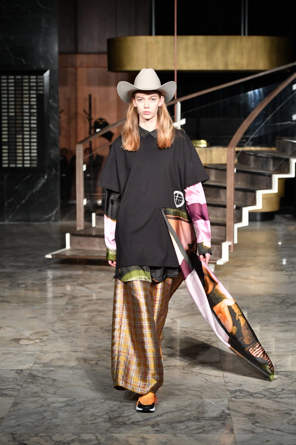 black relaxed top with multi flared pants