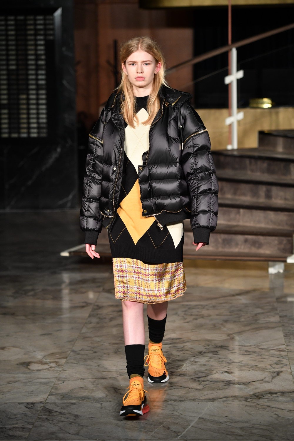 black puffer jacket with color-blocked dress
