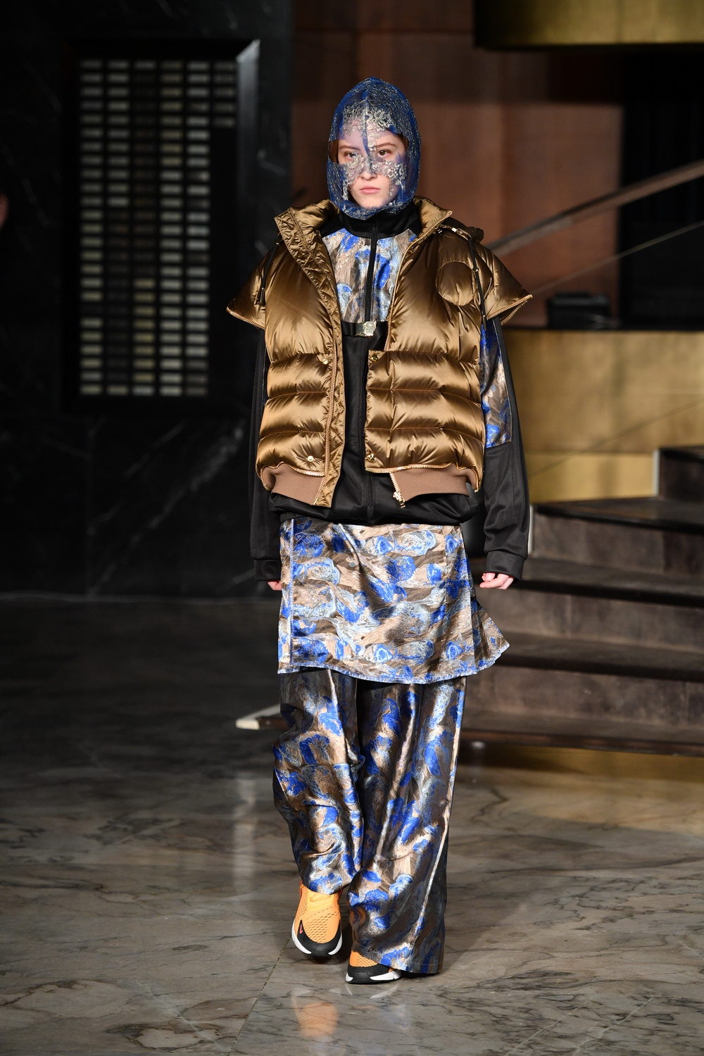 brown padded vest with black top