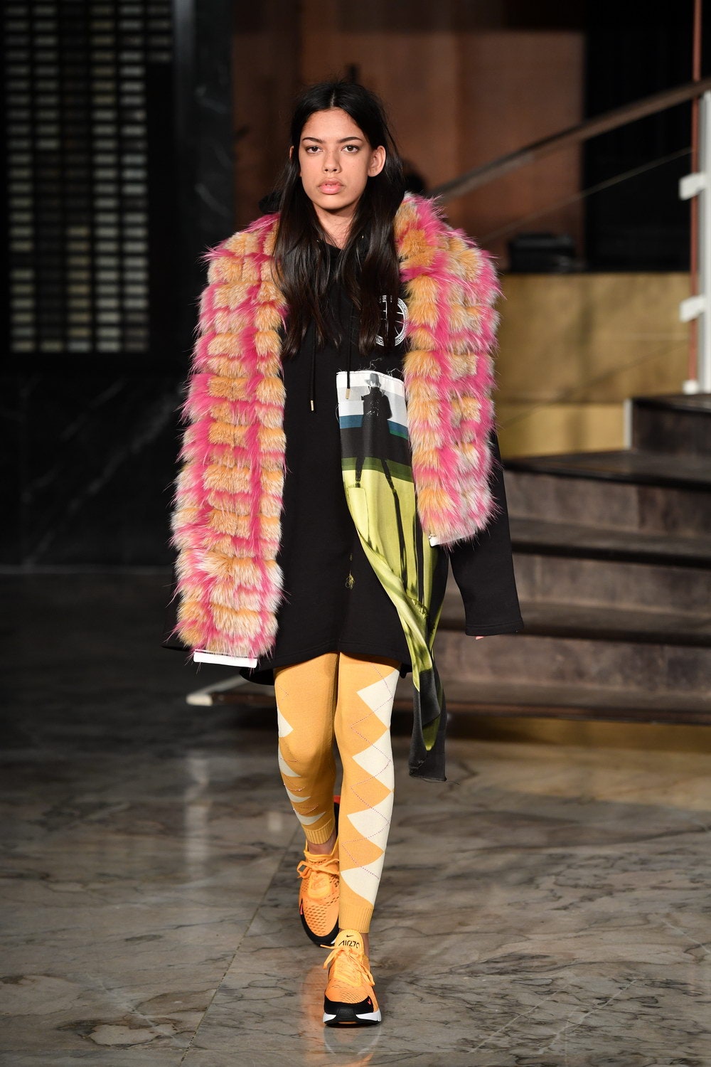 black hooded dress with pink faux-fur coat