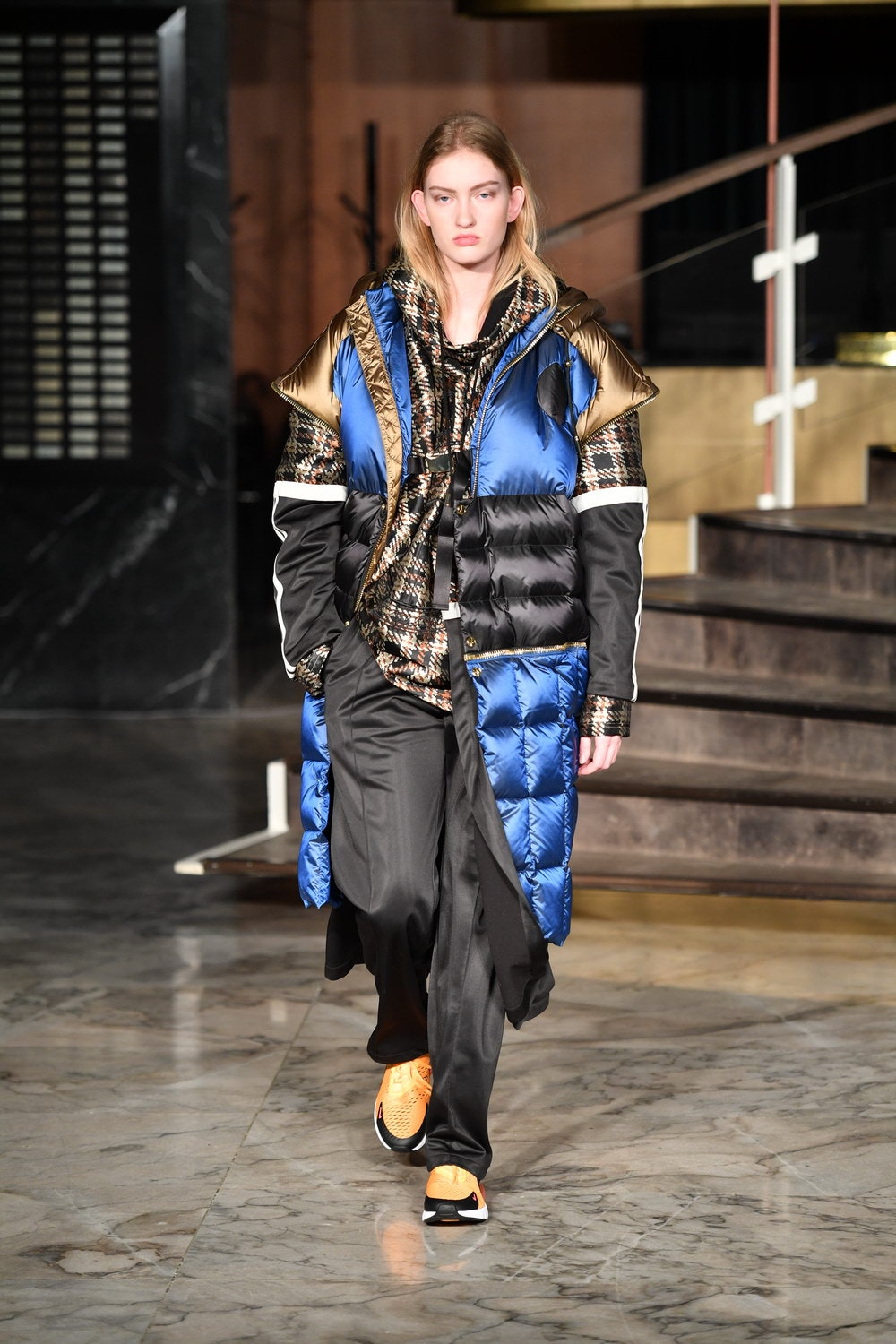 blue padded coat with checked shirt