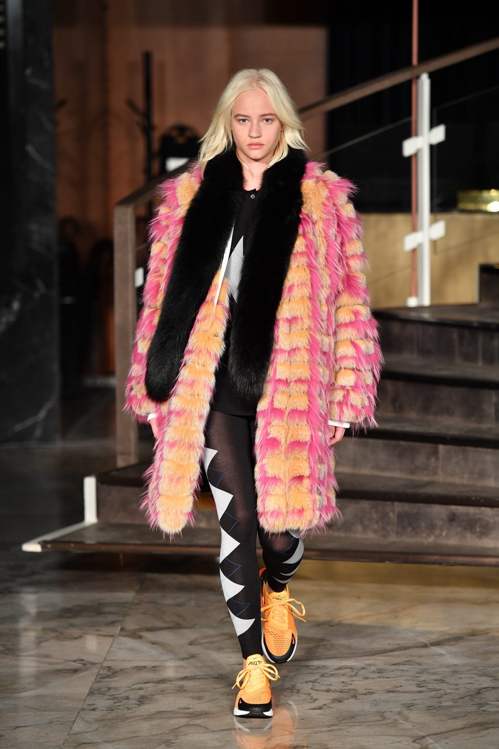 pink faux-fur coat with leggings