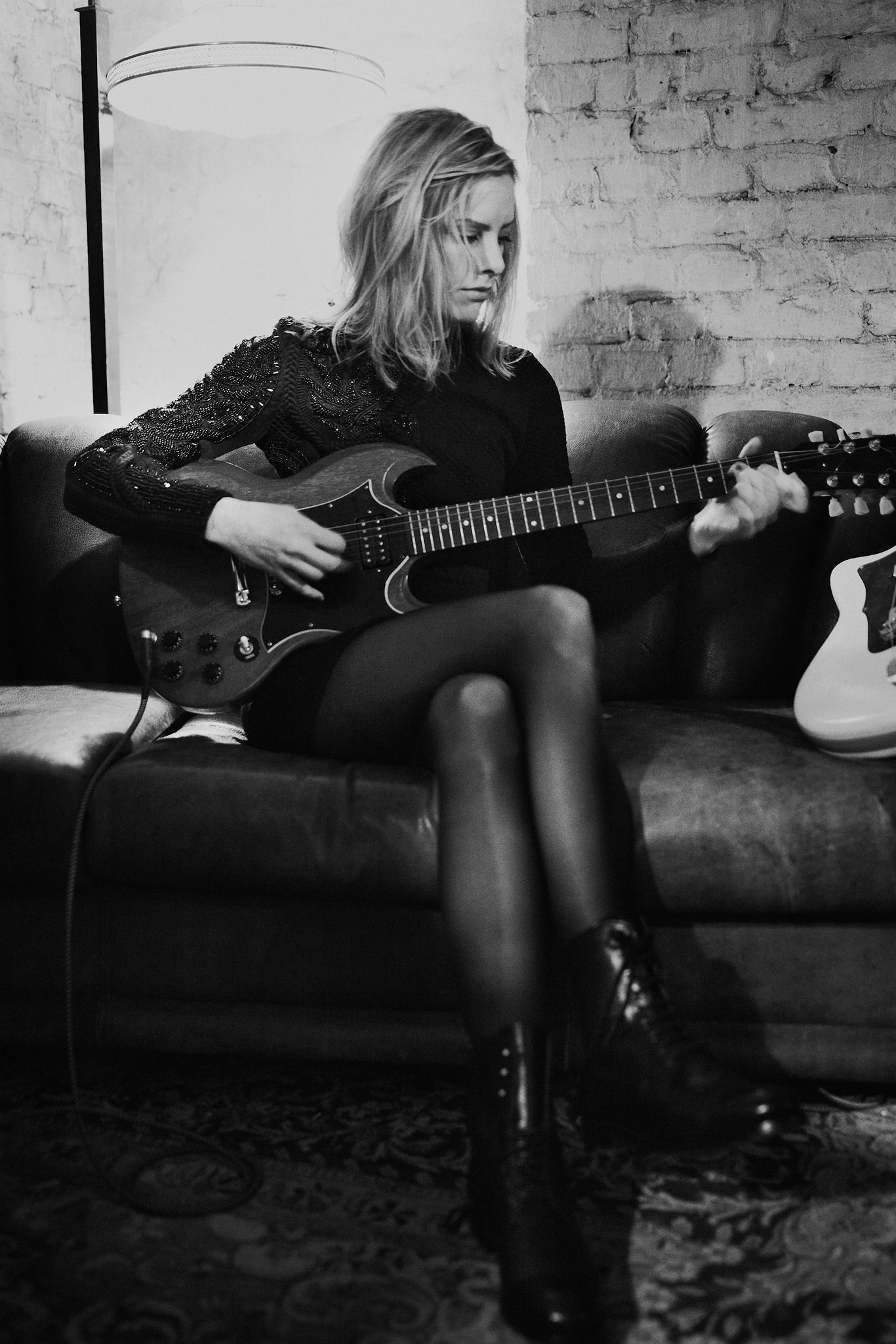 black leather fitted zippered boots