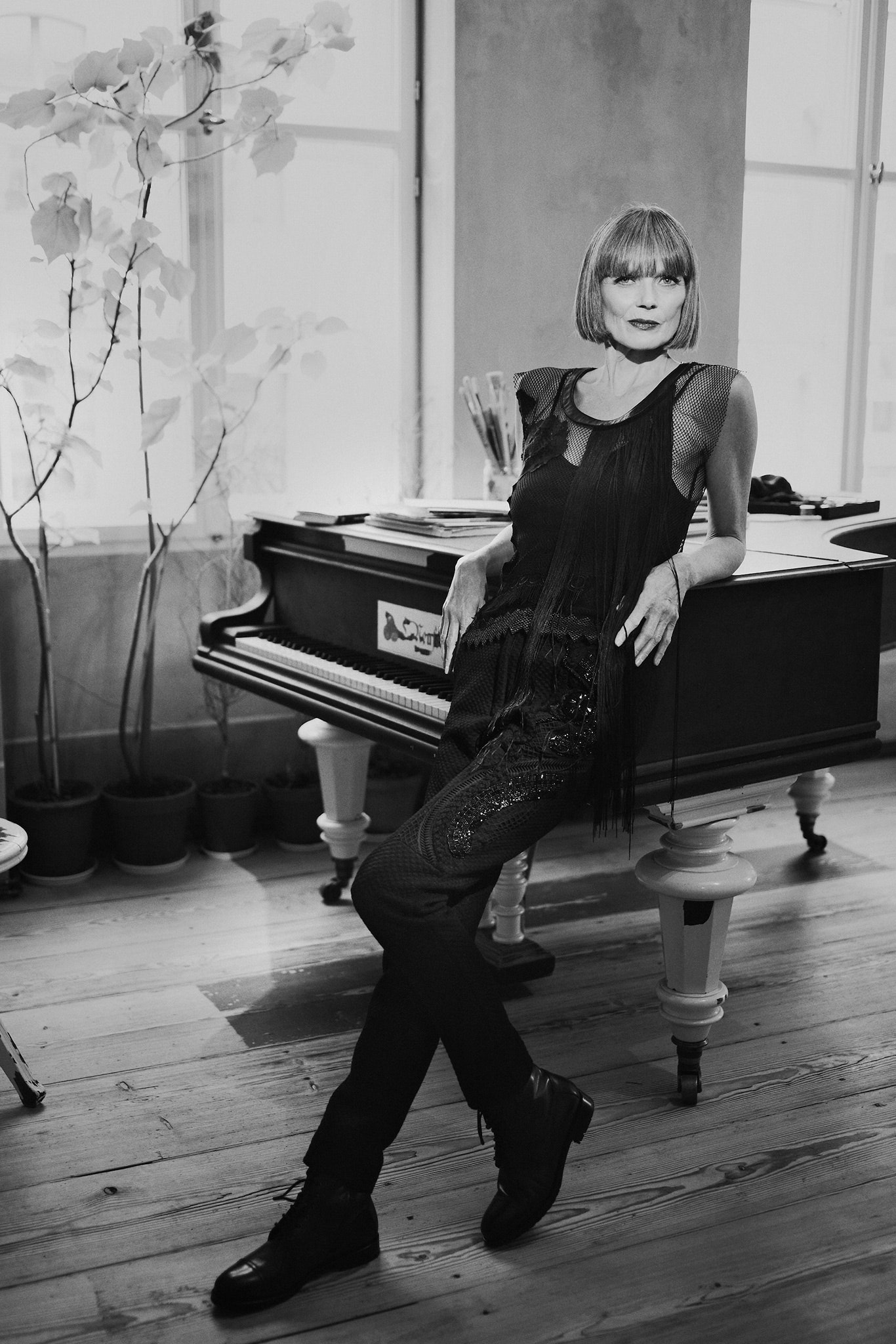 black fitted silk top and pants