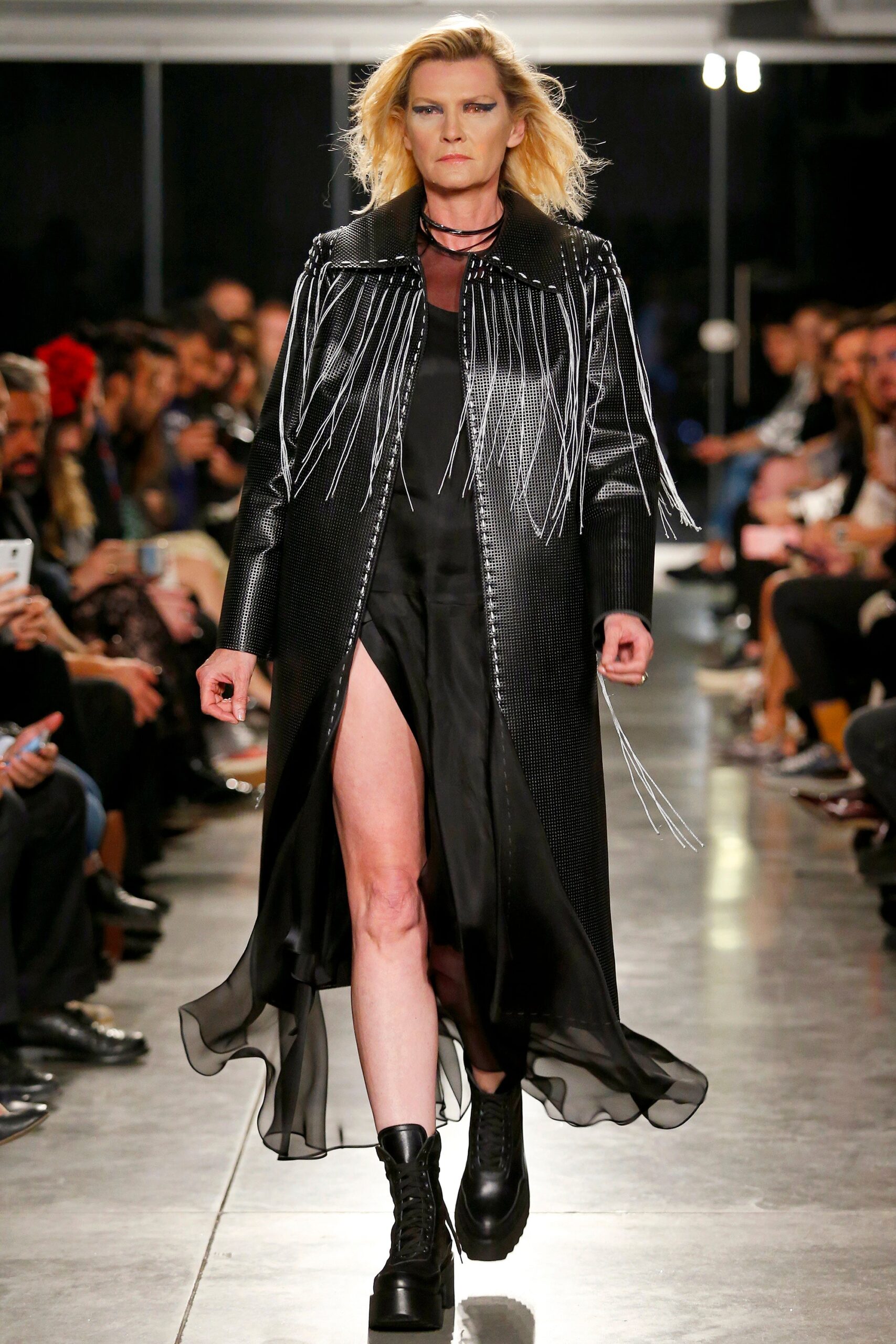 black silk dress with slit and leather coat