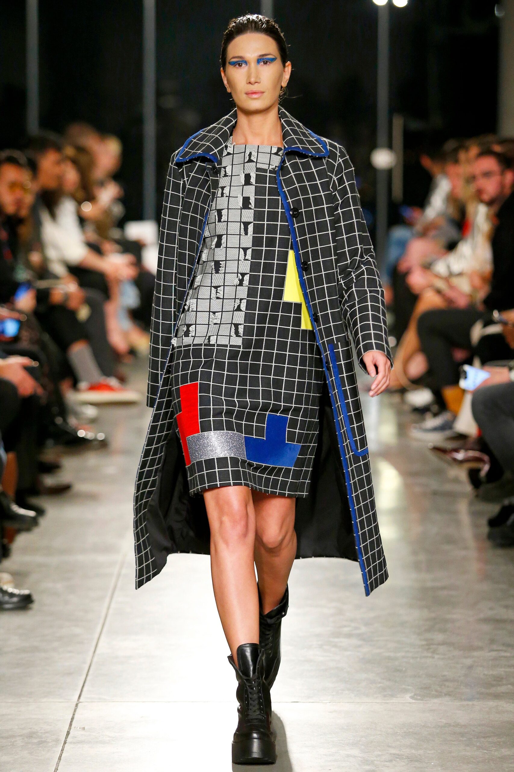 checked coat and fitted dress