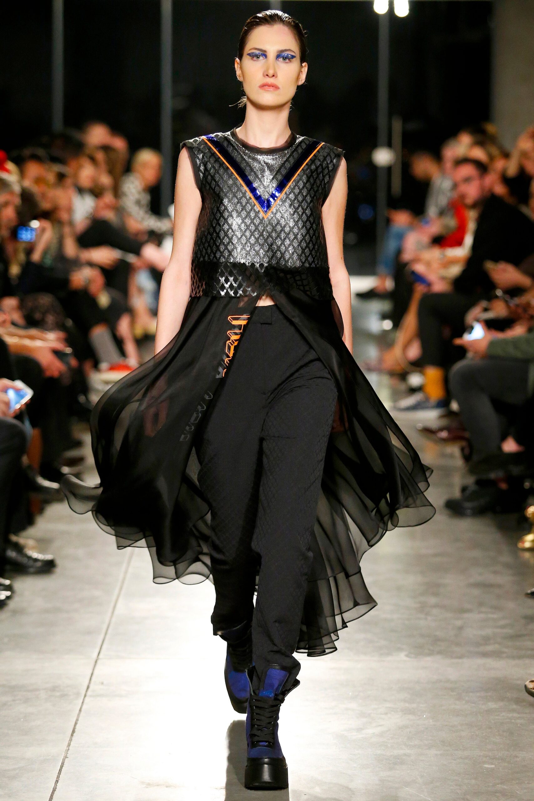 black fitted top and slim pants