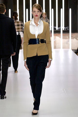 beige tailored blazer with black pants
