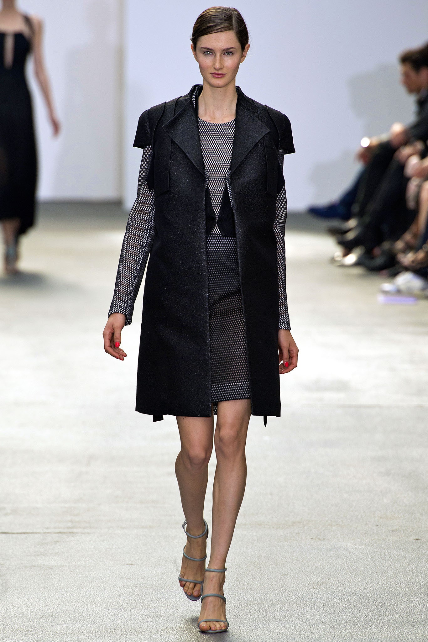 black cotton long-sleeve collared structured zippered coat
