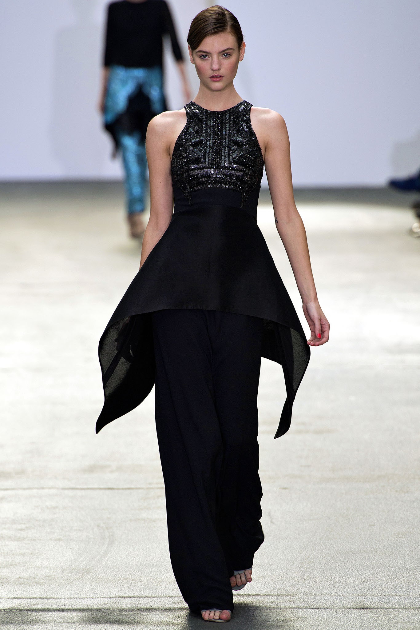 black embellished sleeveless top with wide-leg pants