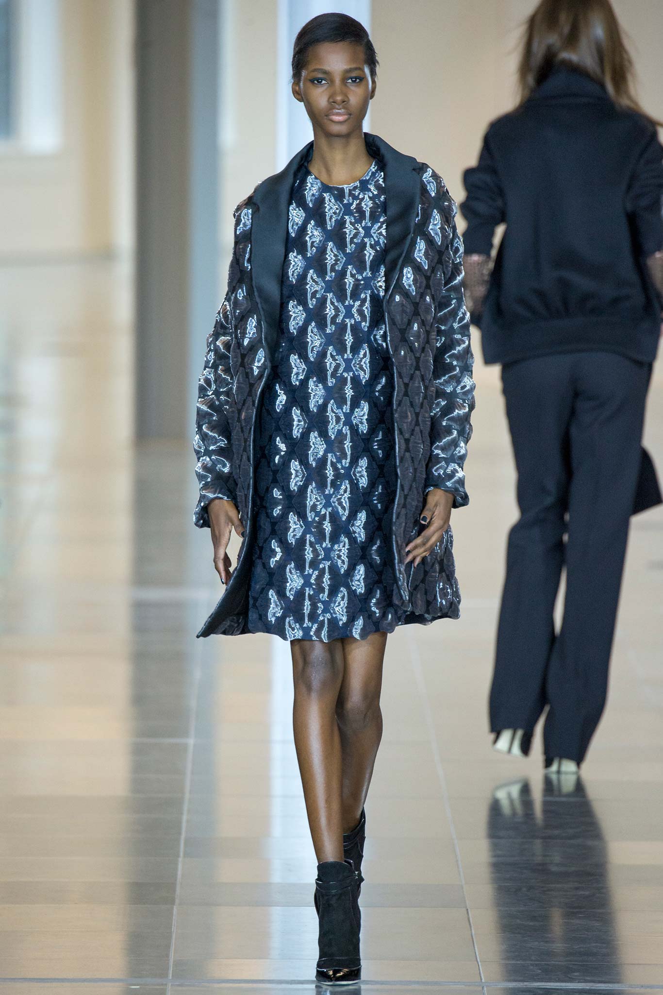 black and white printed mini dress with quilted coat