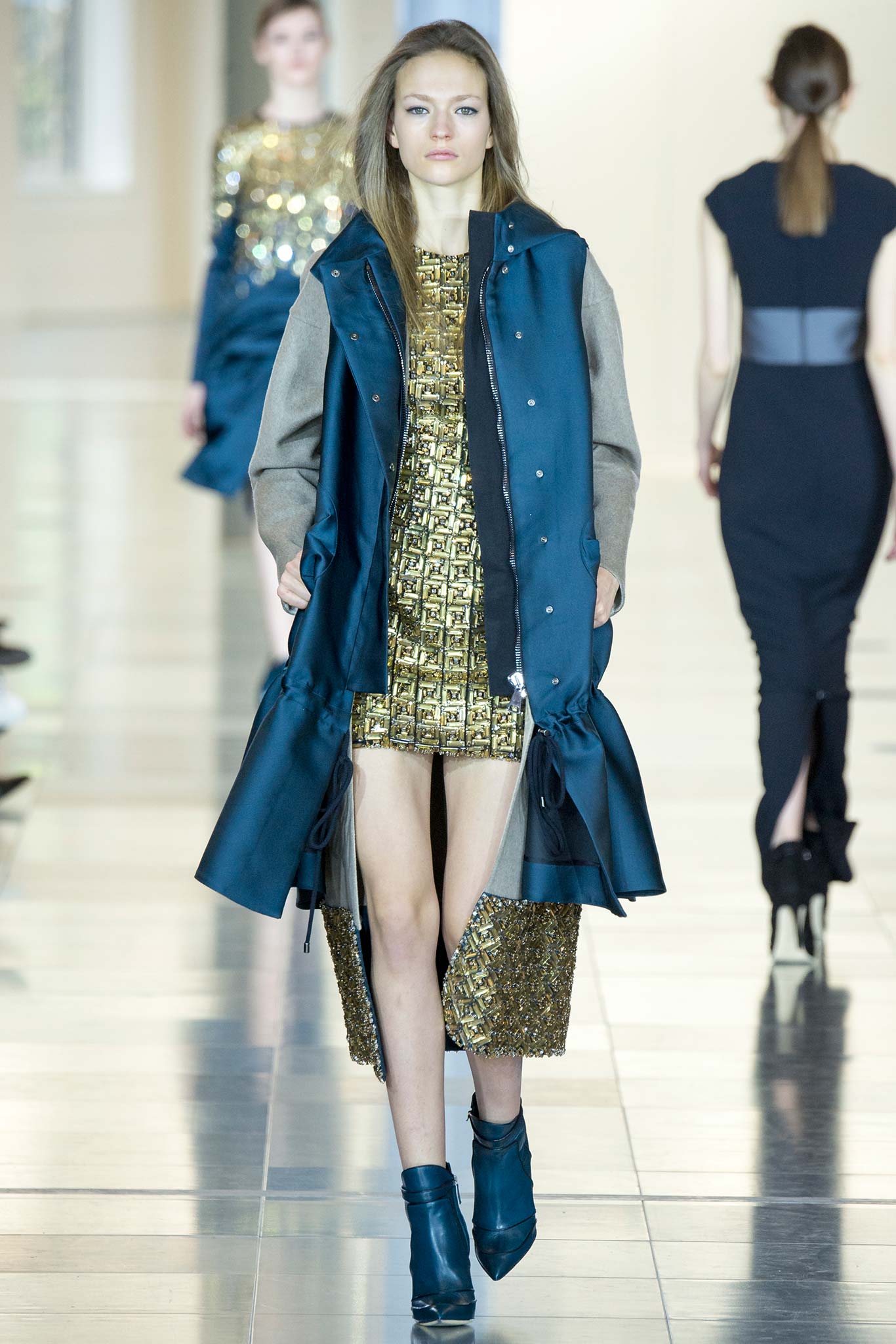 gold pleated mini dress and blue coat