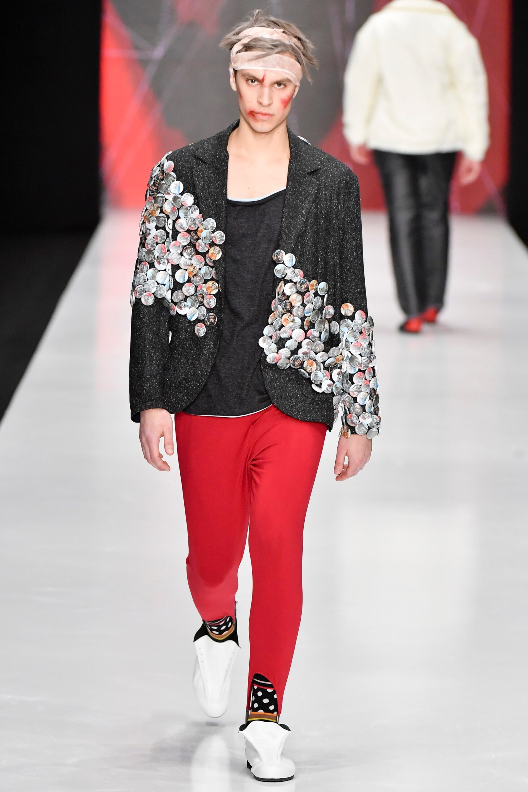 black embellished blazer with red pants