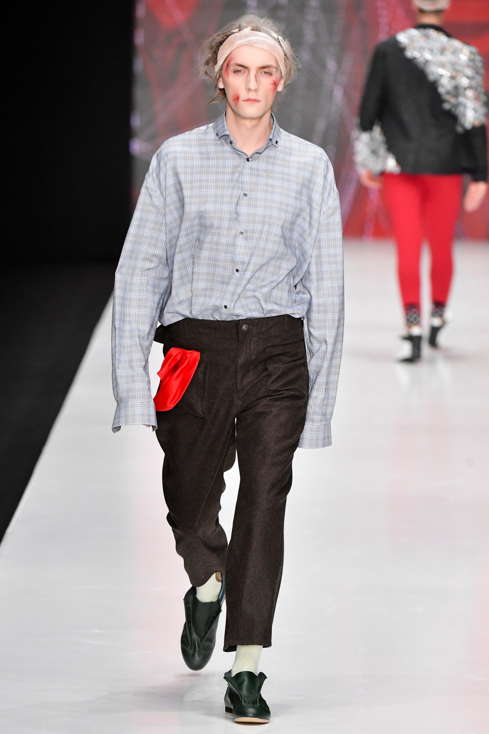 oversized blue checked shirt with relaxed brown pants