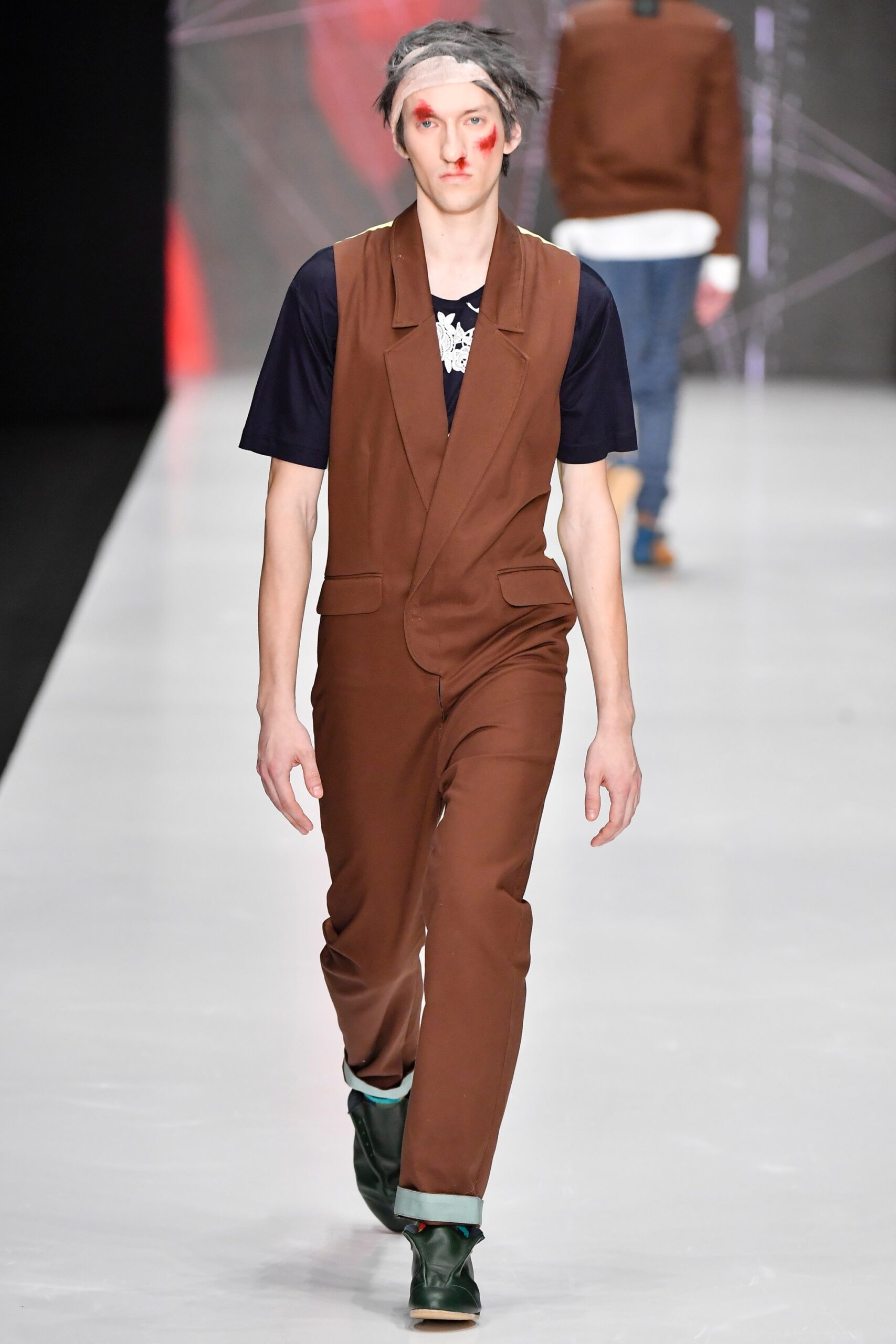 brown tailored suit with navy t-shirt