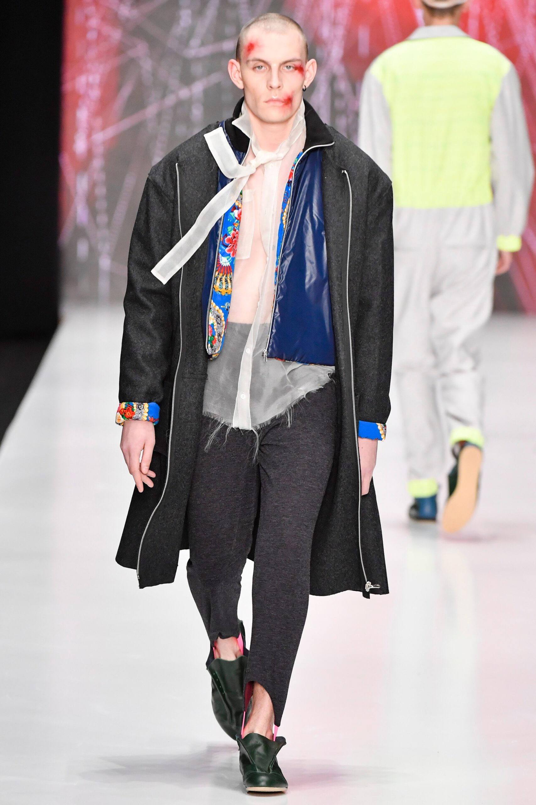 black wool coat with gray pants