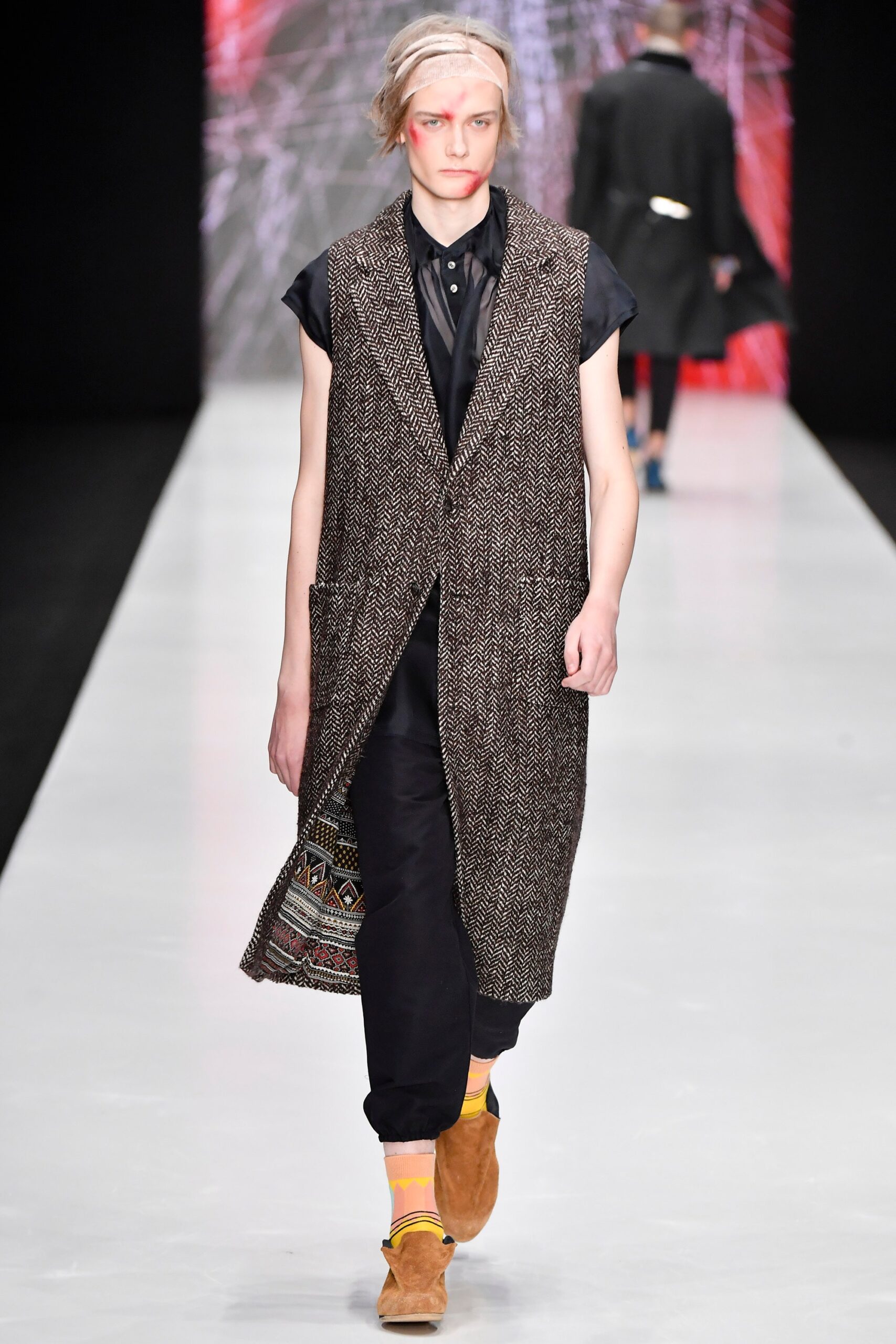 brown wool vest with black shirt