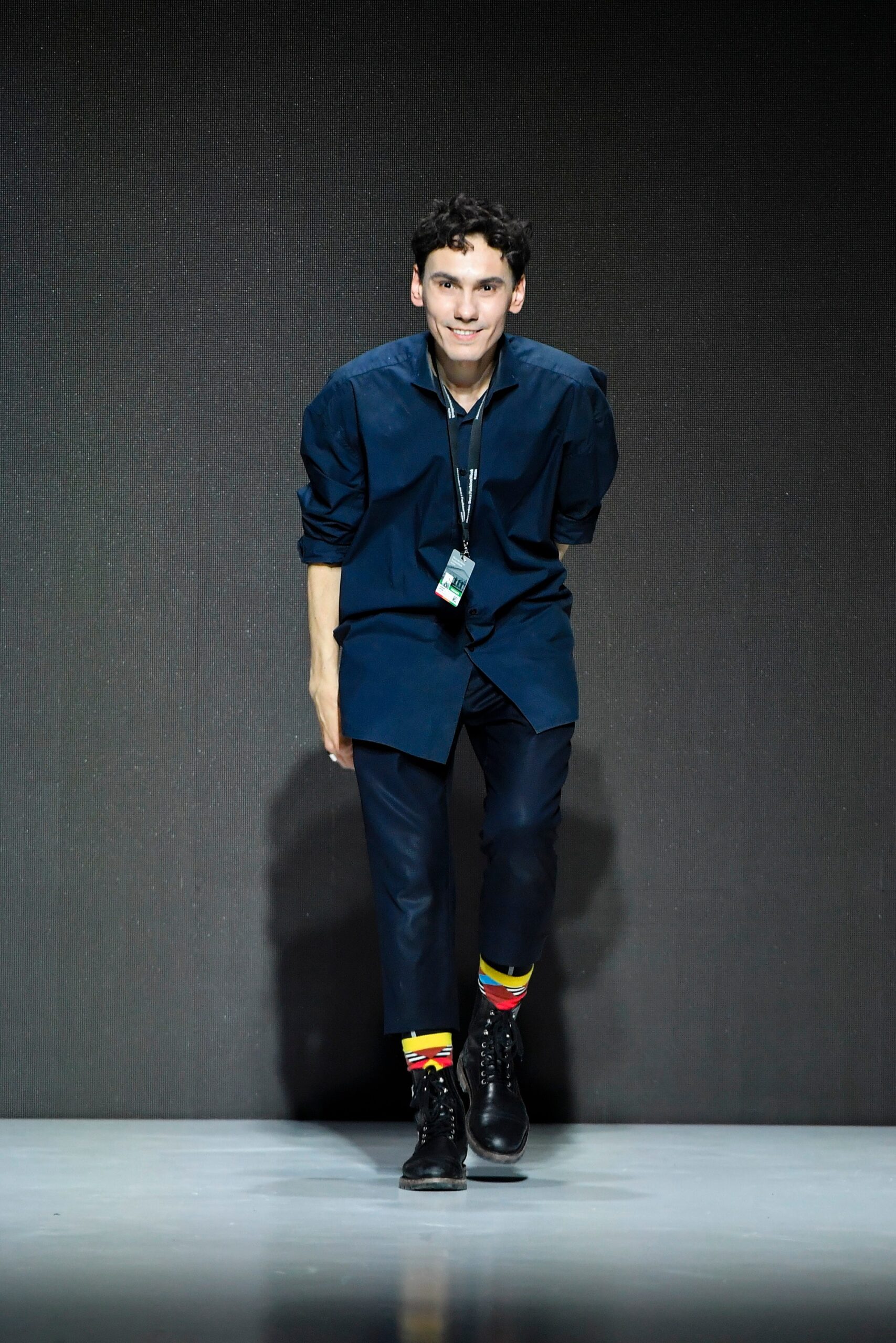 blue relaxed shirt with black pants