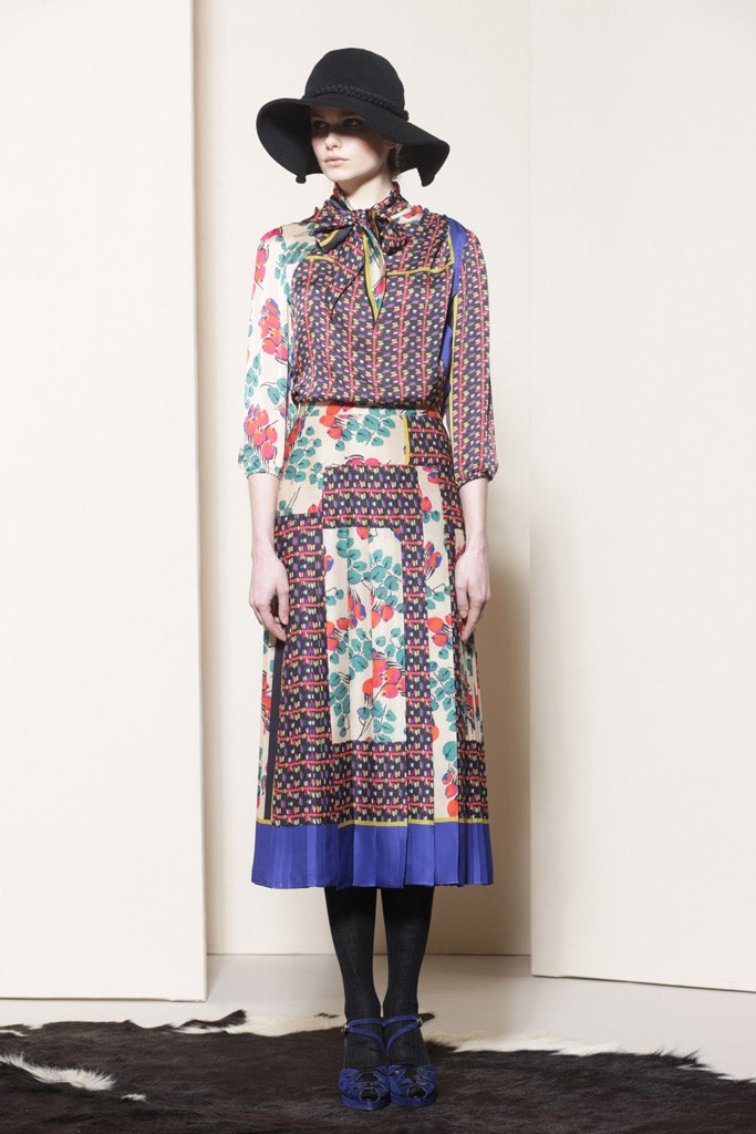 multi-colored midi dress with black hat