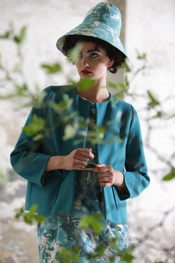 teal jacket blue dress floral hat