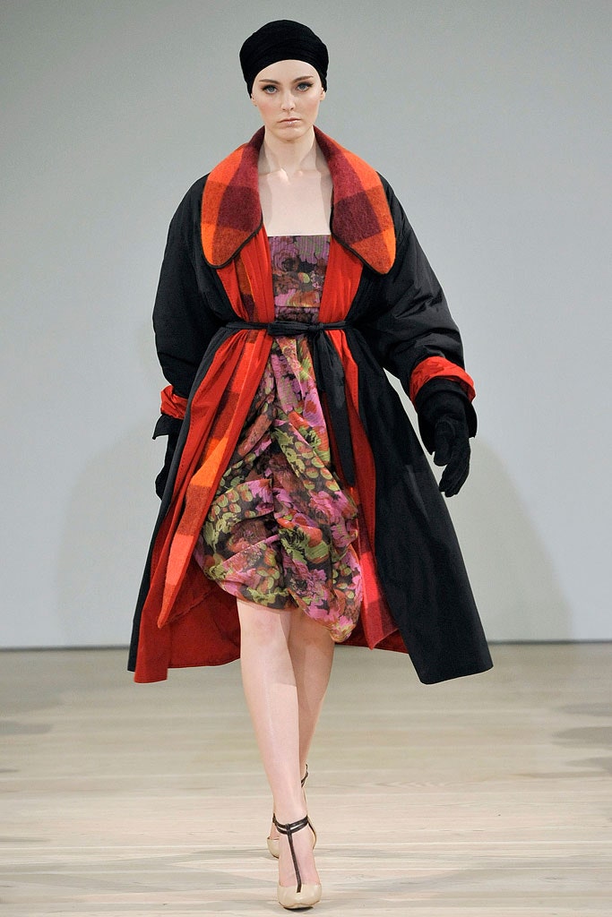 black wool coat with multi-colored dress