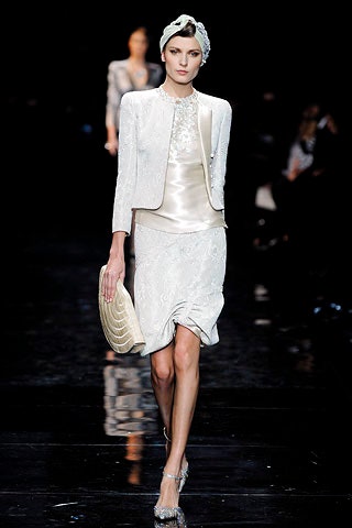 white silk fitted jacket and top