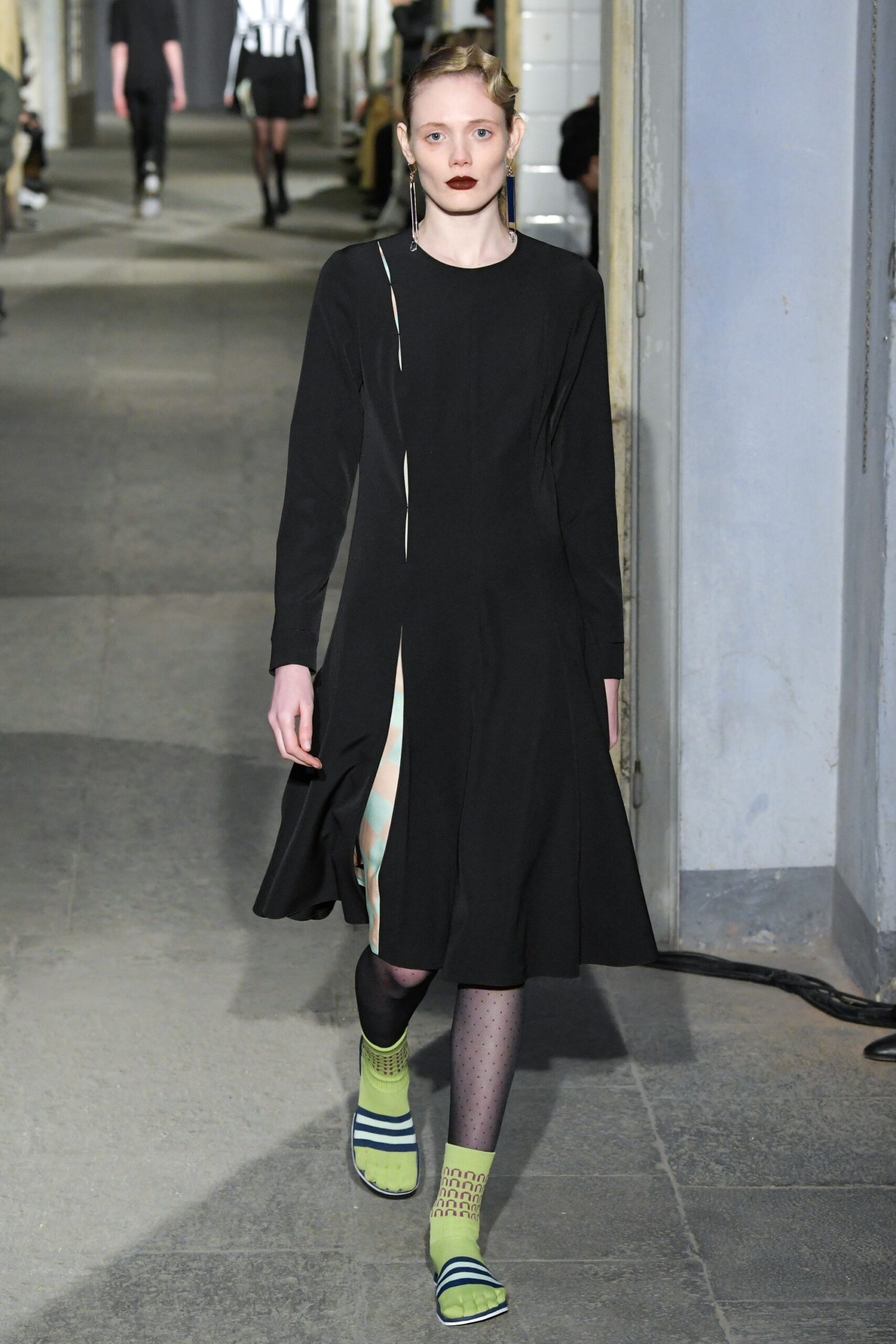 black fitted midi dress
