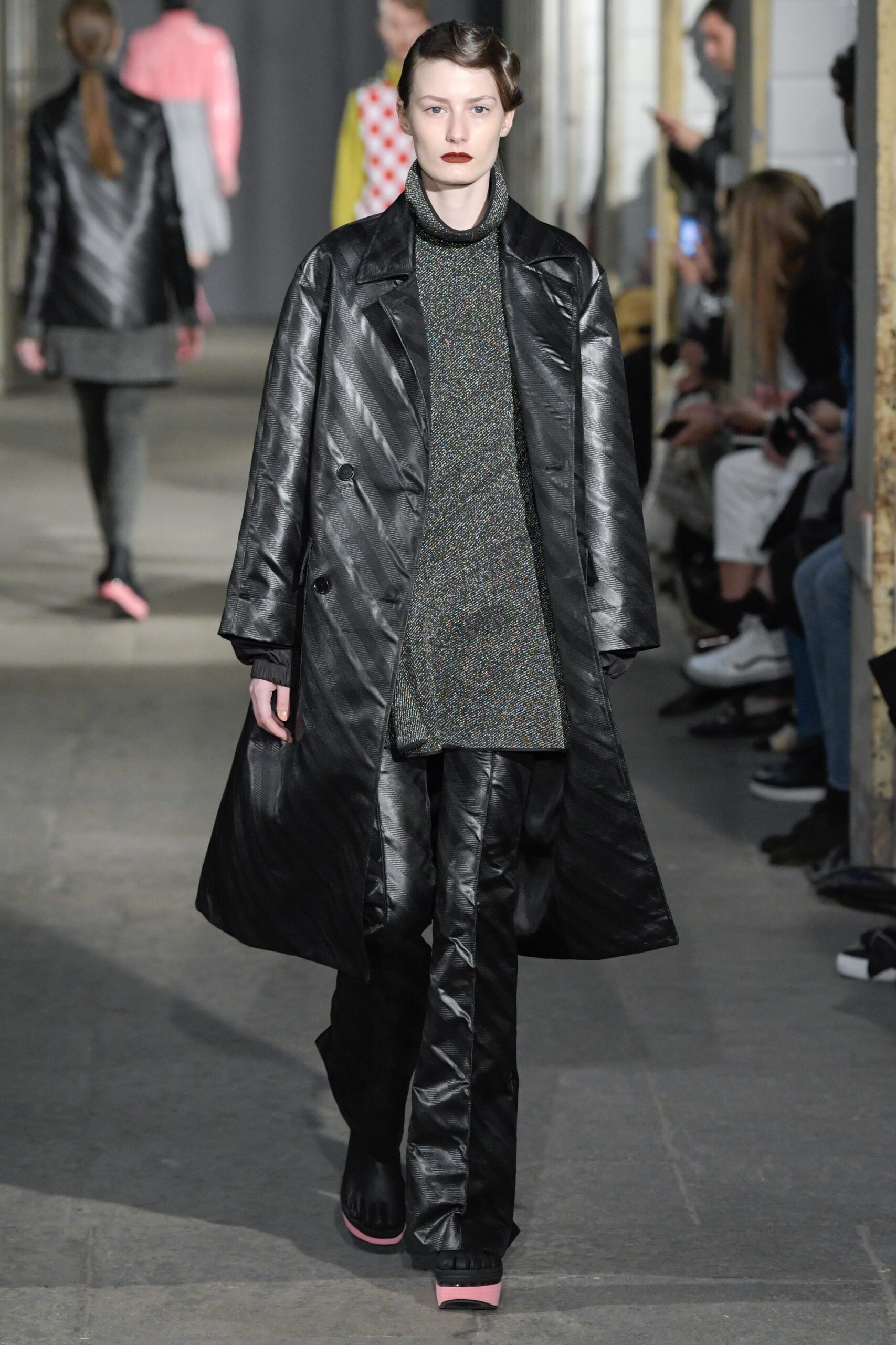 black leather long-sleeve collared relaxed zippered coat
