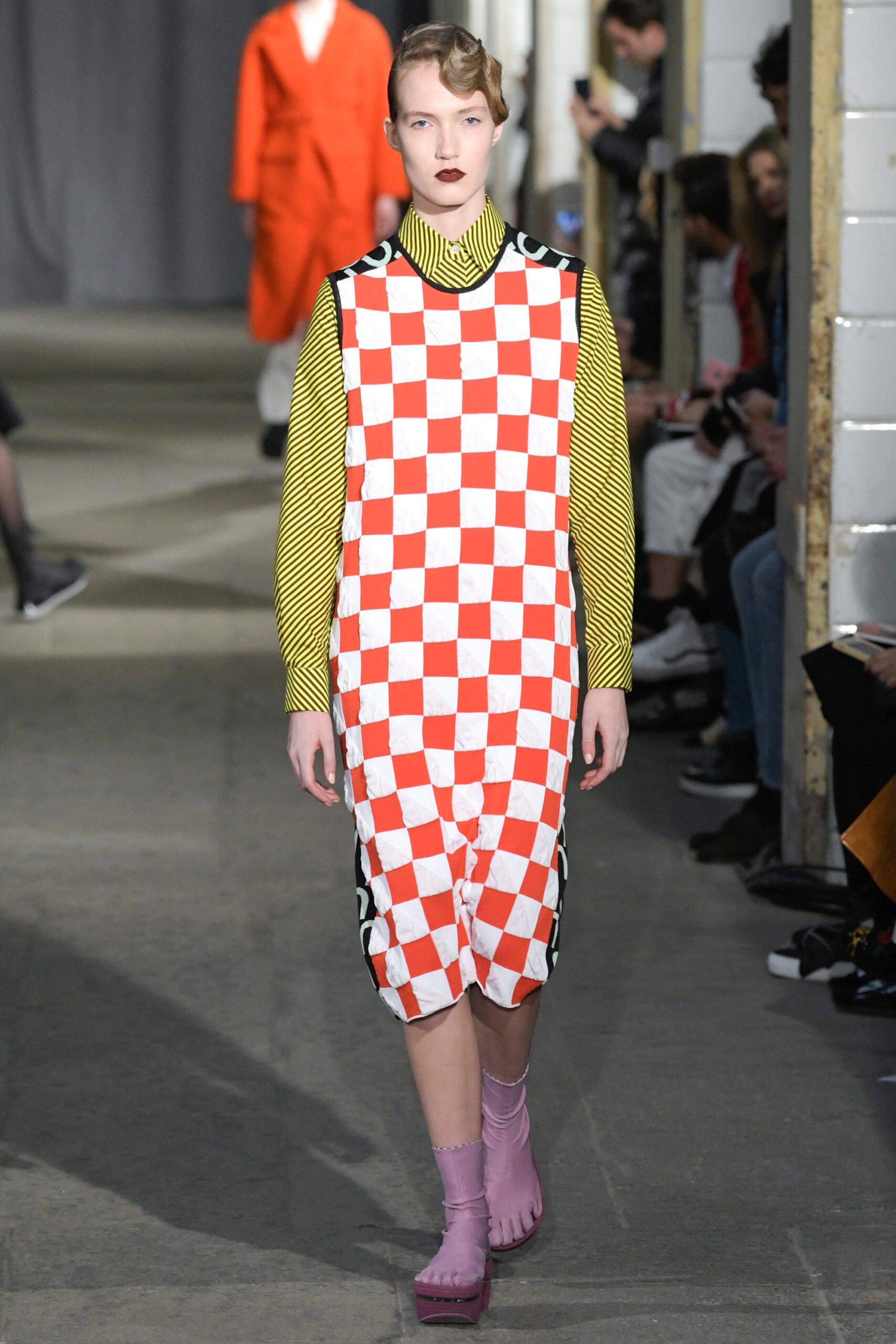 checked midi dress with pink boots
